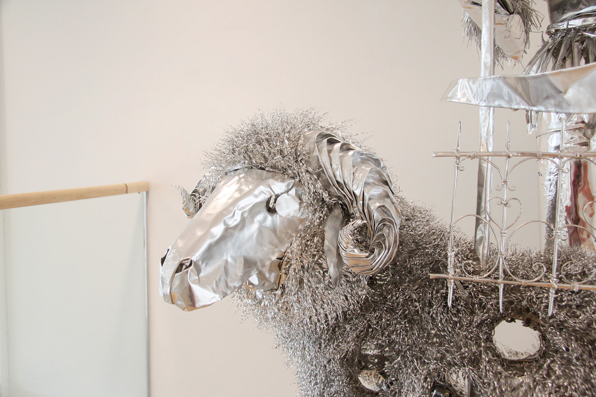 Title: Anonymous relatives -gate keeper-, Year:2013, Material:Aluminum foil, Size:130x90x 250(h)cm