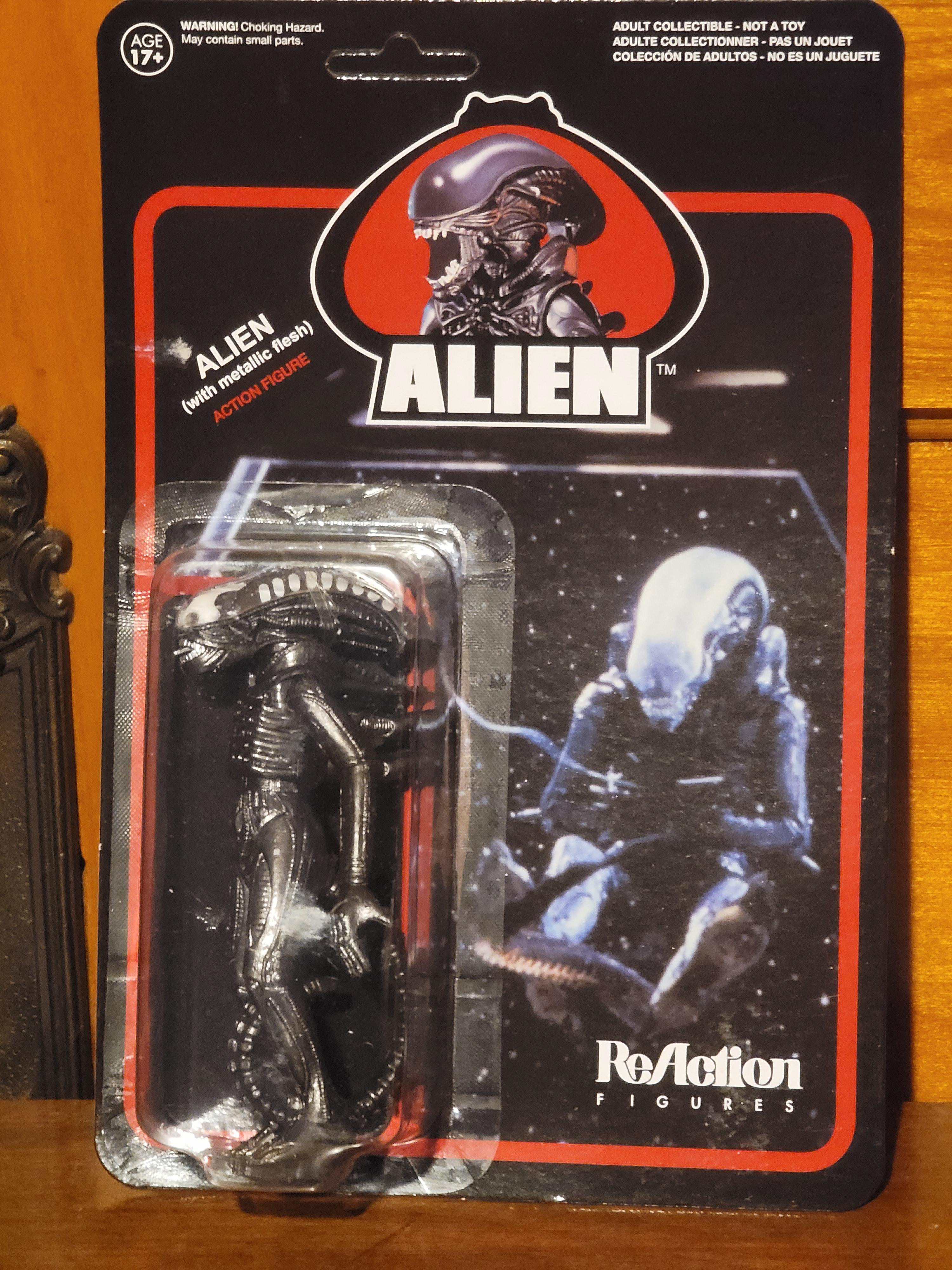 64: Super7 reaction figure black Alien on black harpooned Alien card 