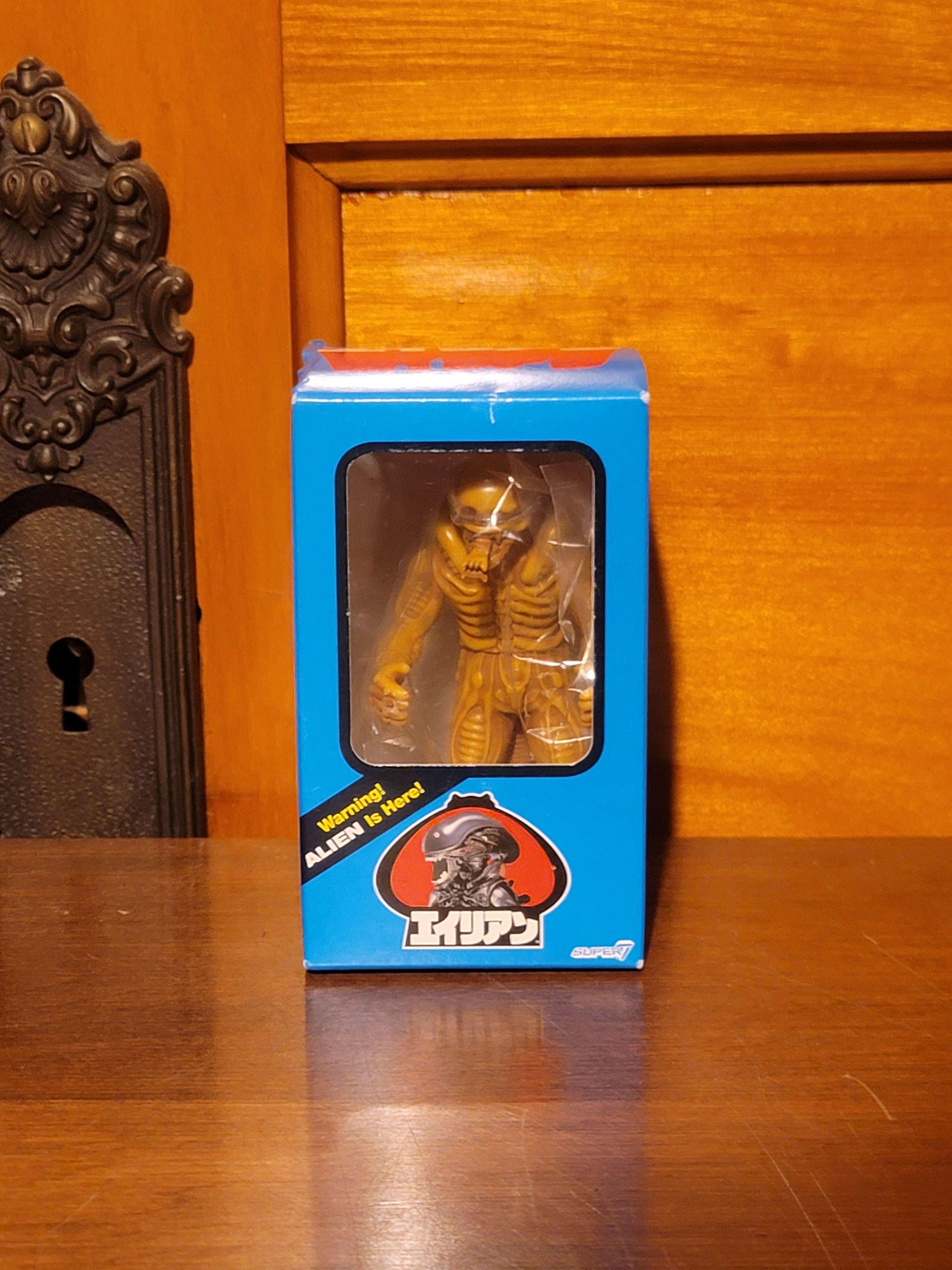 26: Super 7 secret base miniature vinyl Alien brown open mouth
