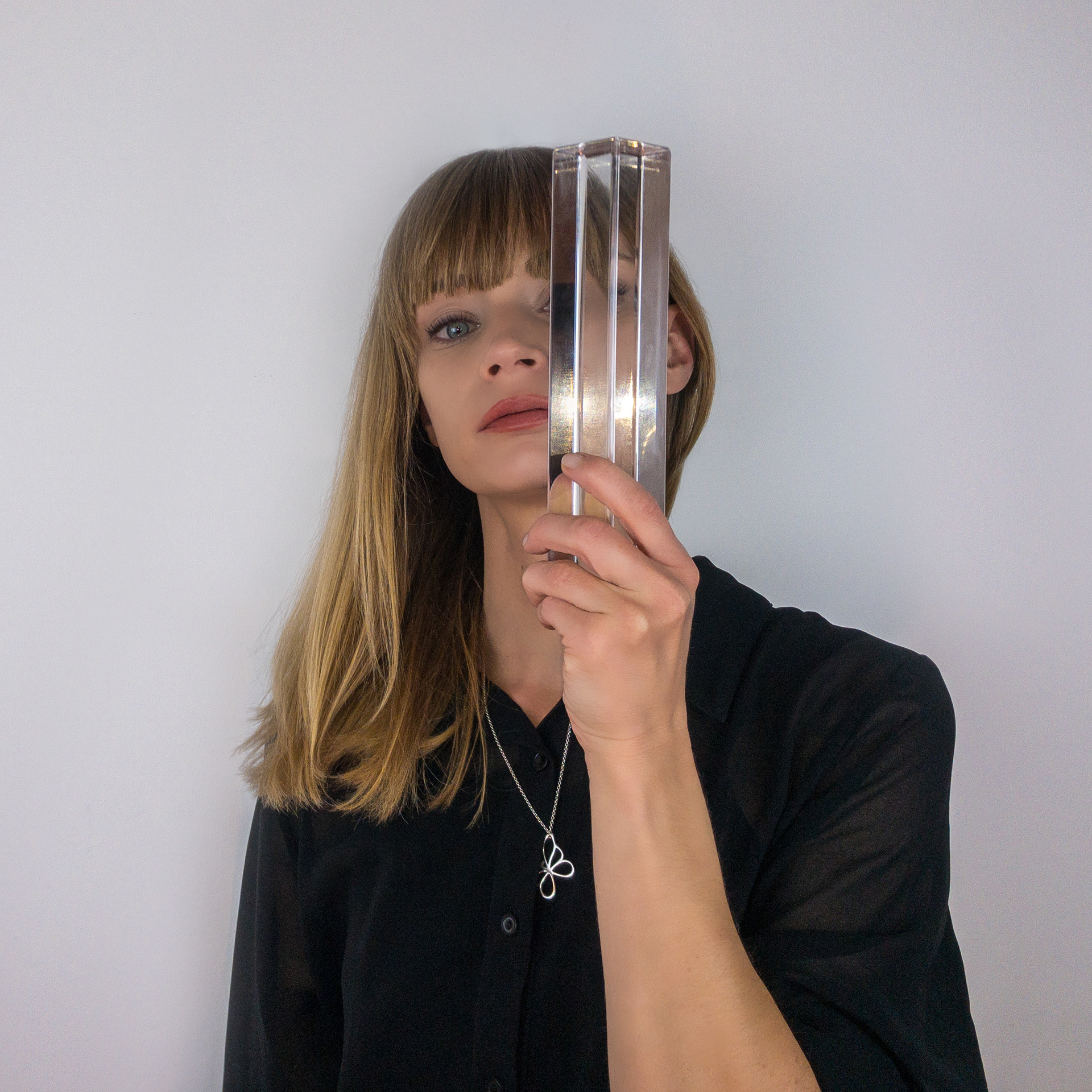 Portrait Designer Miriam Elting with glass distortion