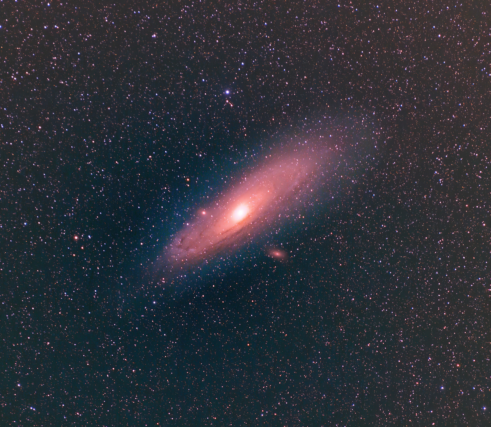 Our incredible galactic neighbor, Messier 31 (The Andromeda Galaxy). The photons captured here traveled at light speed for 2.5 million years to enter my lens.