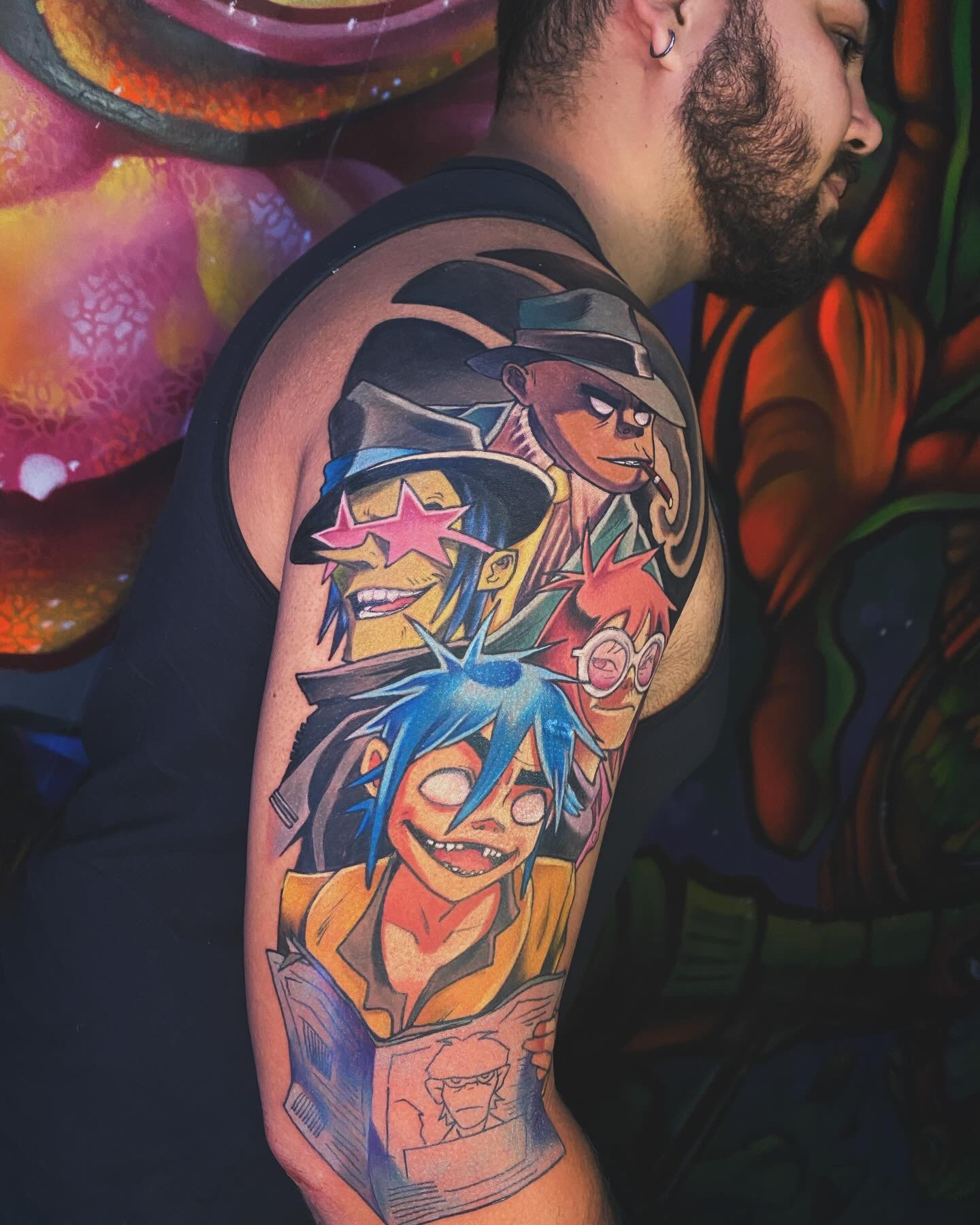 tatuagem colorida banda gorillaz