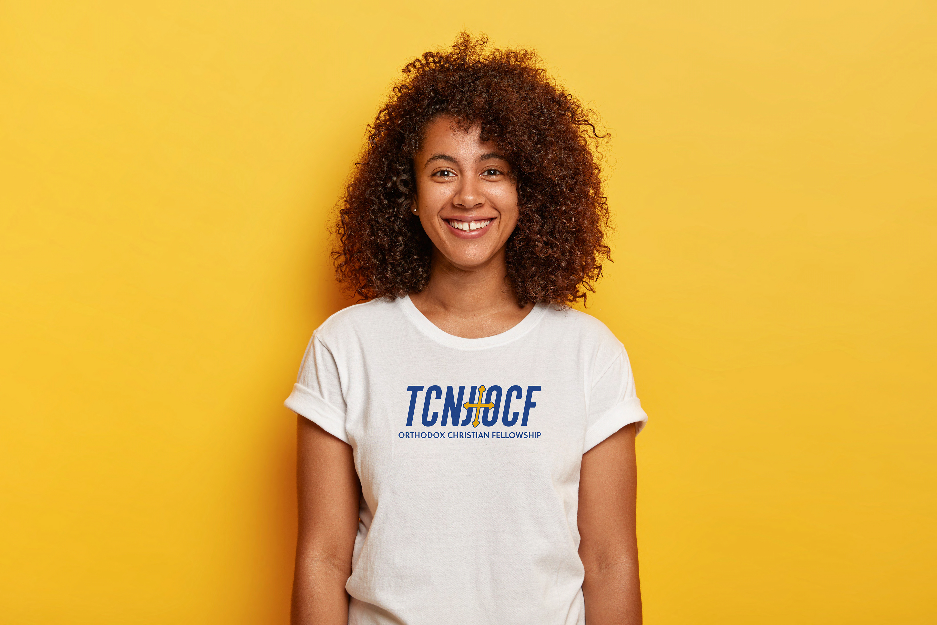 <a href="https://www.freepik.com/free-photo/headshot-beautiful-dark-skinned-curly-has-pleased-expression-rejoices-success-enjoys-spare-time-wears-casual-t-shirt-isolated-yellow-wall-people-positive-emotions-feelings-concept_11932440.htm#query=white%20tshirt&position=9&from_view=search&track=sph">Image by wayhomestudio</a> on Freepik