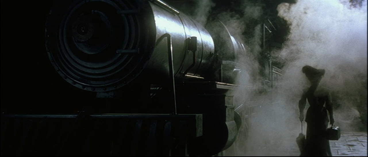 Lily arriving  to New York via train.