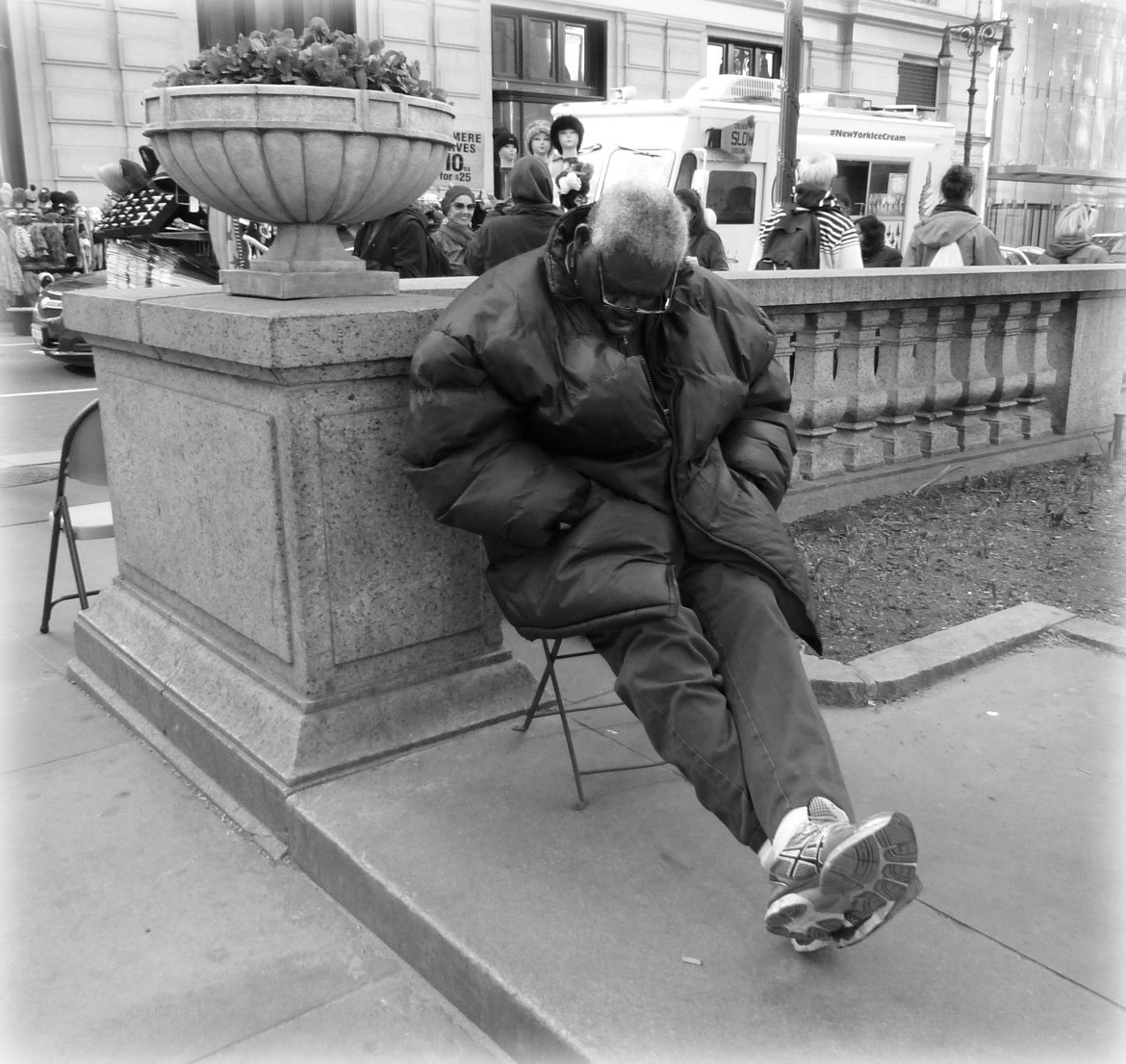 Catching a few Zzzzz outside of the New York Public Library.