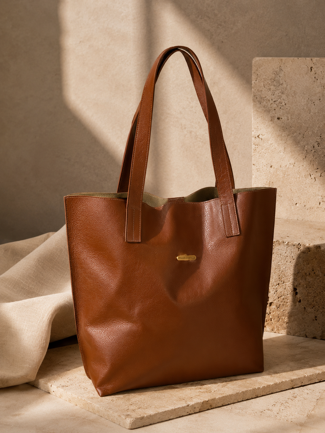 Bolso tote en cuero miel · $ 280.000