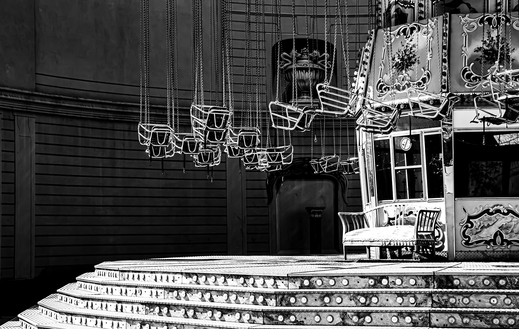 Empty Vienna Prater amusement park during the 2020 COVID-19 lockdown – Ferris wheel and rides without visitors under dramatic sky