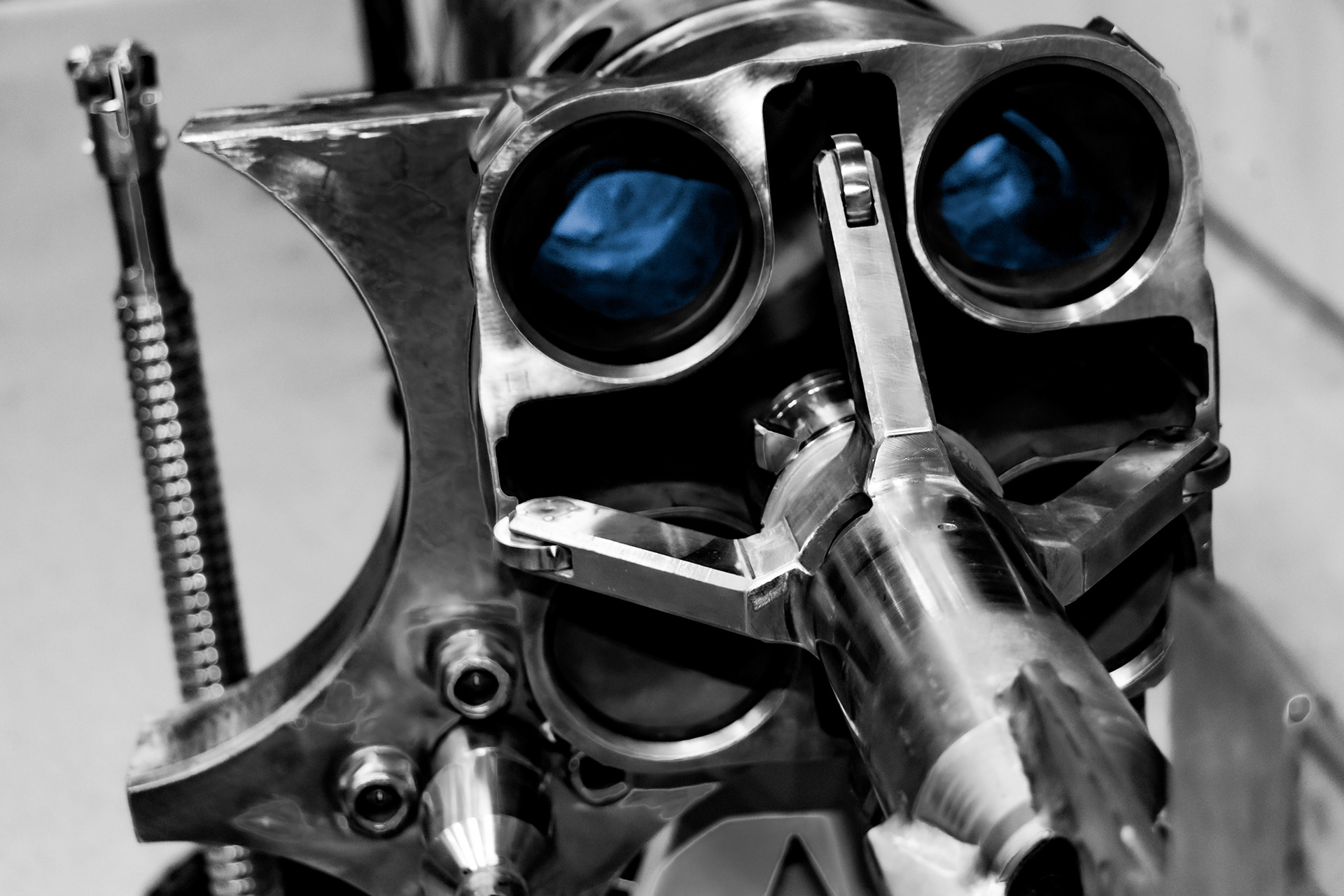 Black and white close-up of metallic structures inside the Zwentendorf nuclear power plant resembling a human face, fine art industrial photography