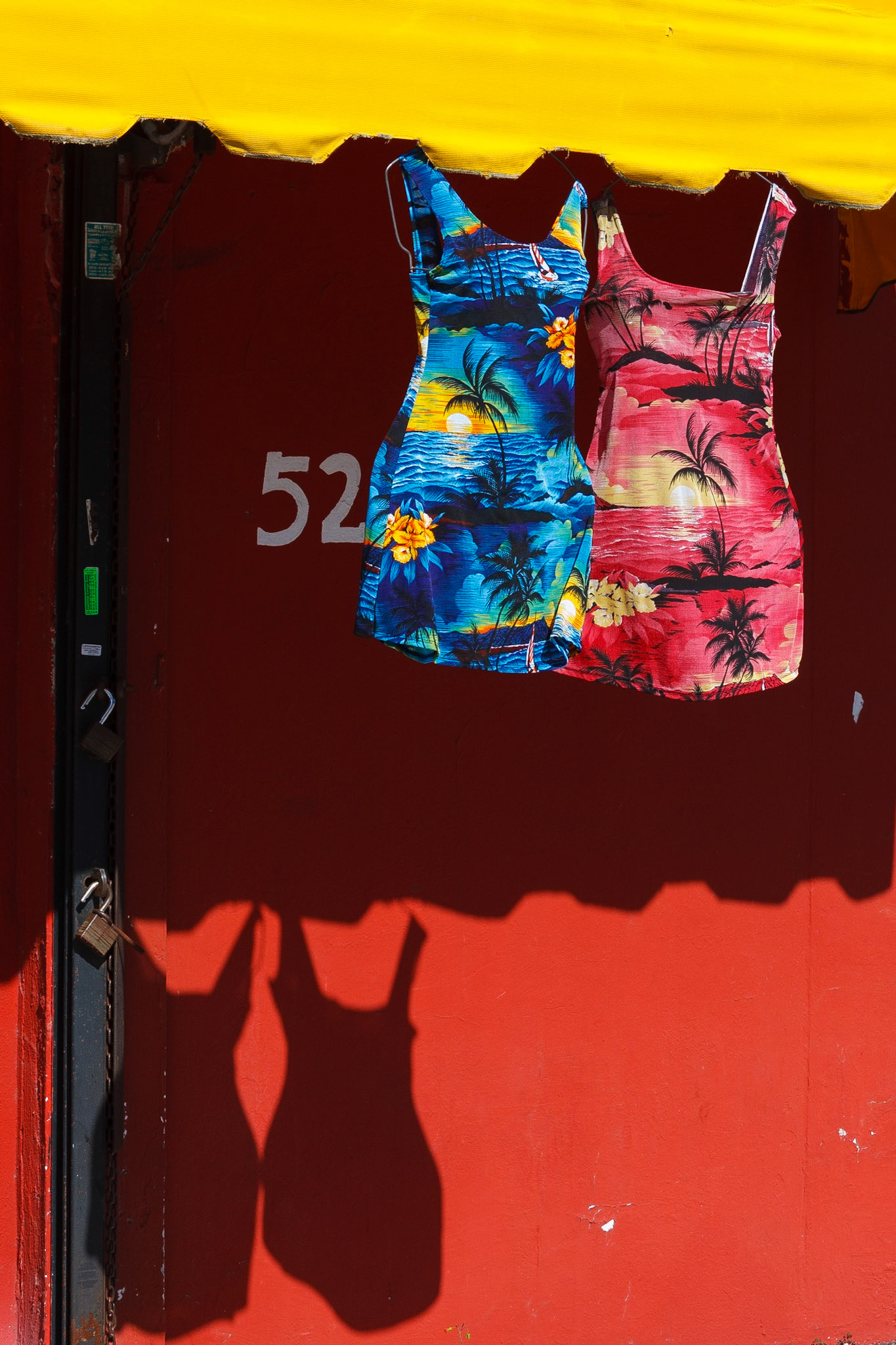 Bathing suits with red background, NW 5th Ave