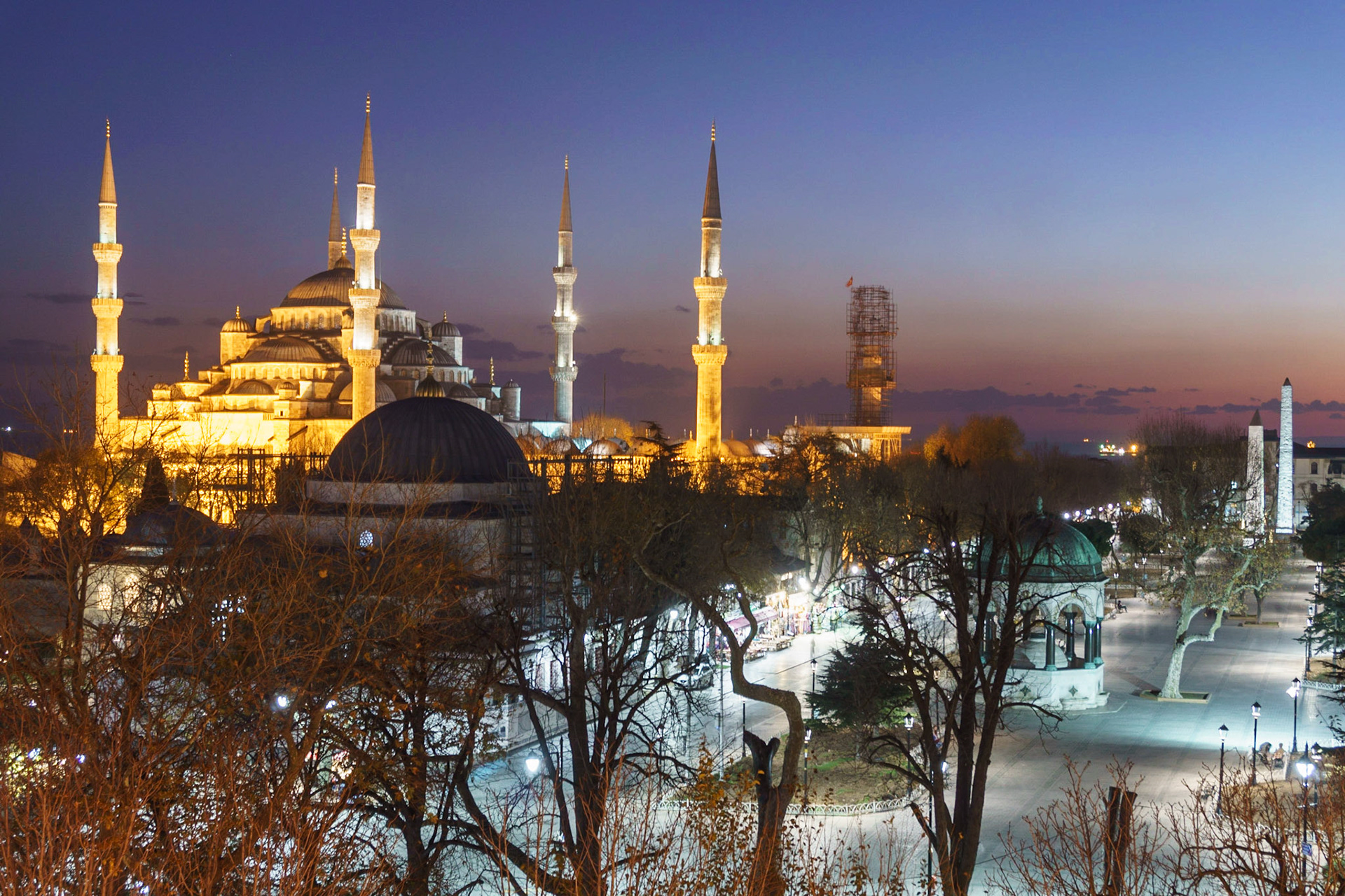 Blue mosque at blue hour with Hippodrome of Constantinople in foreground