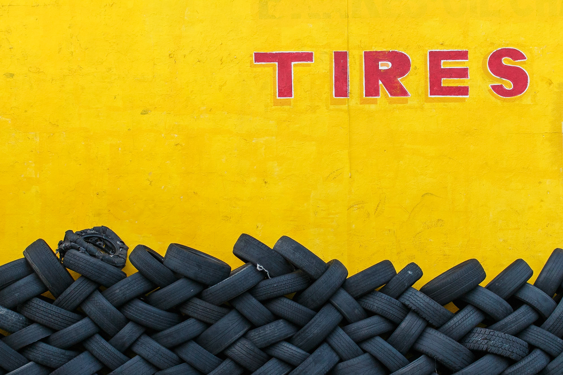 Tires on yellow, NW 7th Ave