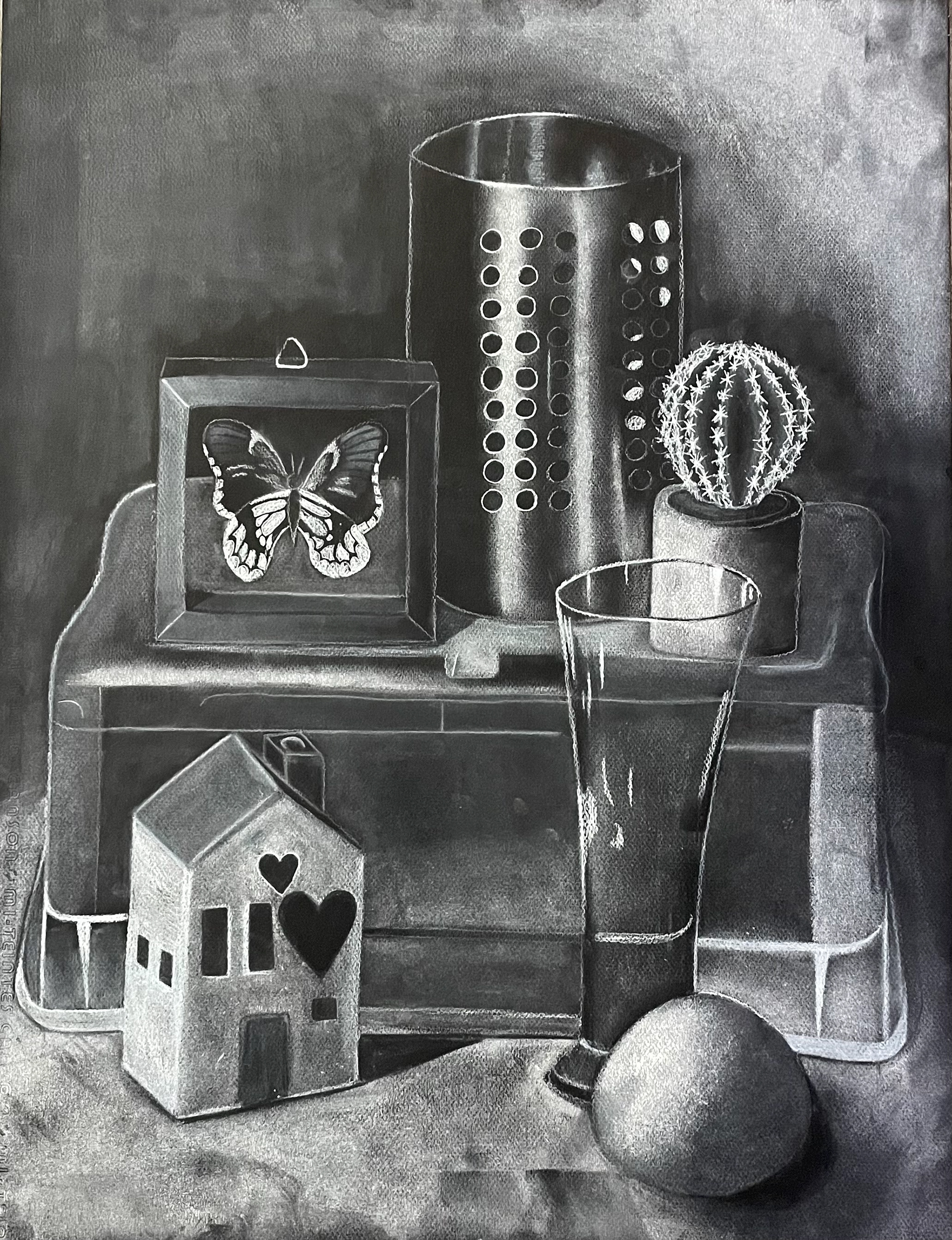 Still life created on black charcoal paper with white charcoal