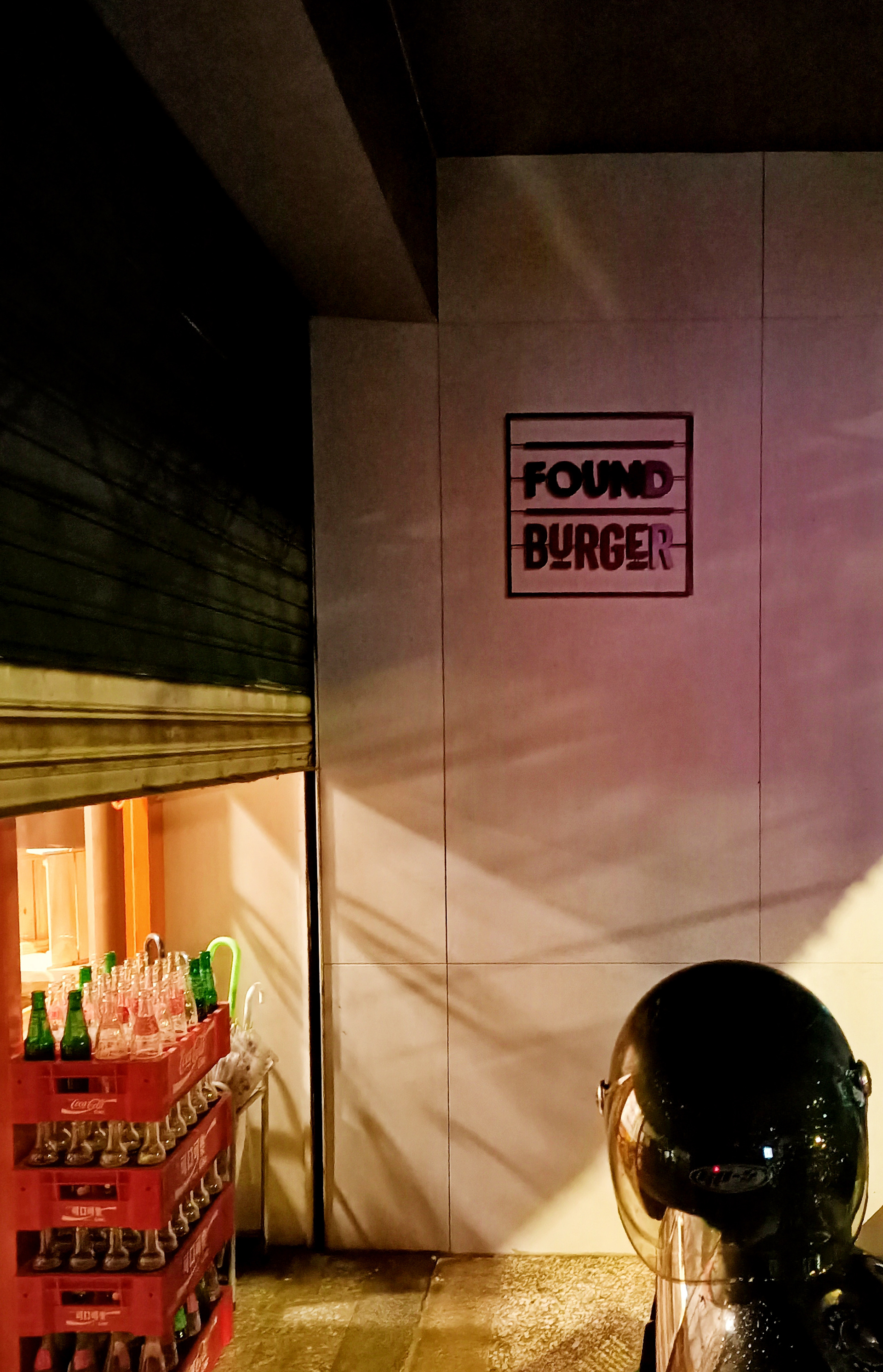 Found Burger on Wall made out of Metal Logo  design by Jose Amaral / Studio 279