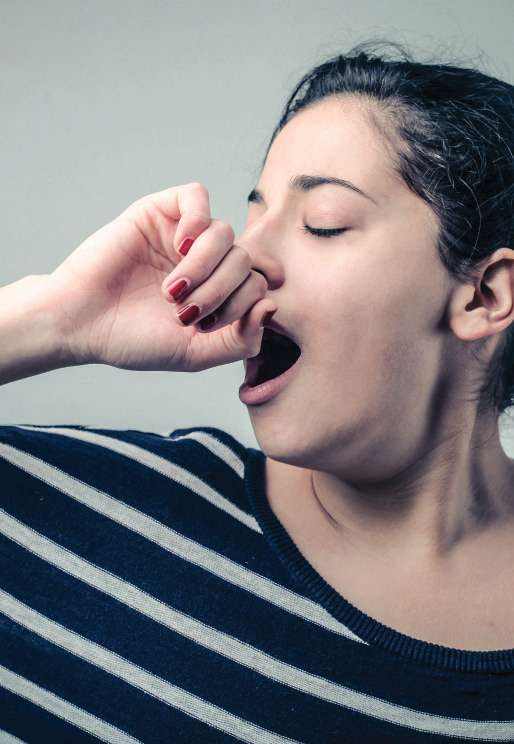 Inducing a yawn as a way to interrupt smoking pattern