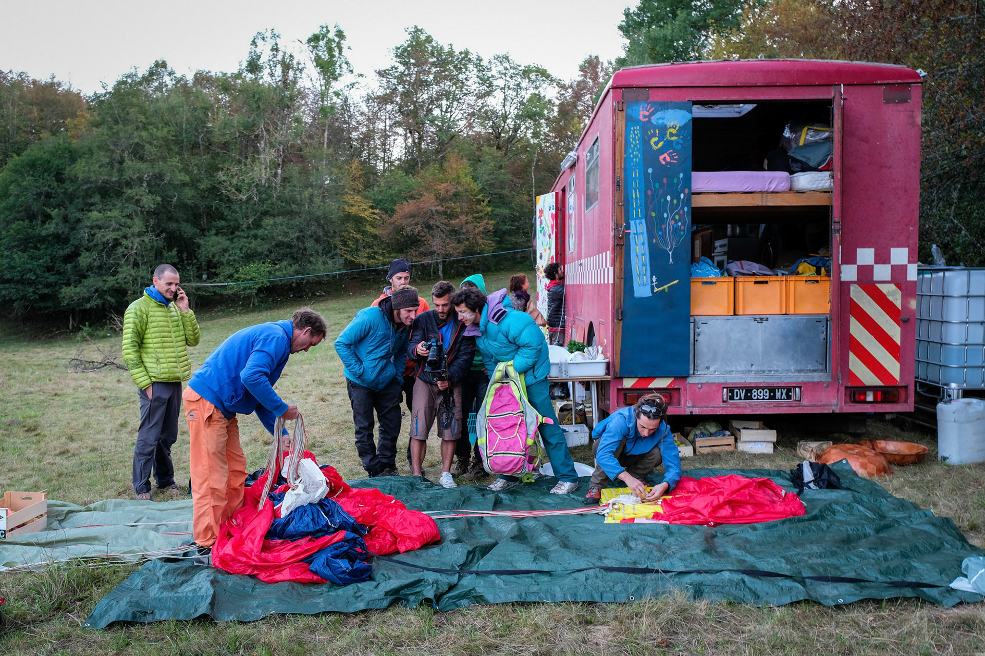 SAINT-JULIEN-EN-VERCORS, FRANCE - SEPTEMBER 24: A group of people preparing for a base jump session, Auvergne-rhône-alpes, Saint-julien-en-vercors, France on September 24, 2016 in Saint-julien-en-vercors, France. (Photo by Fred Marie/Art in All of Us/Corbis via Getty Images)