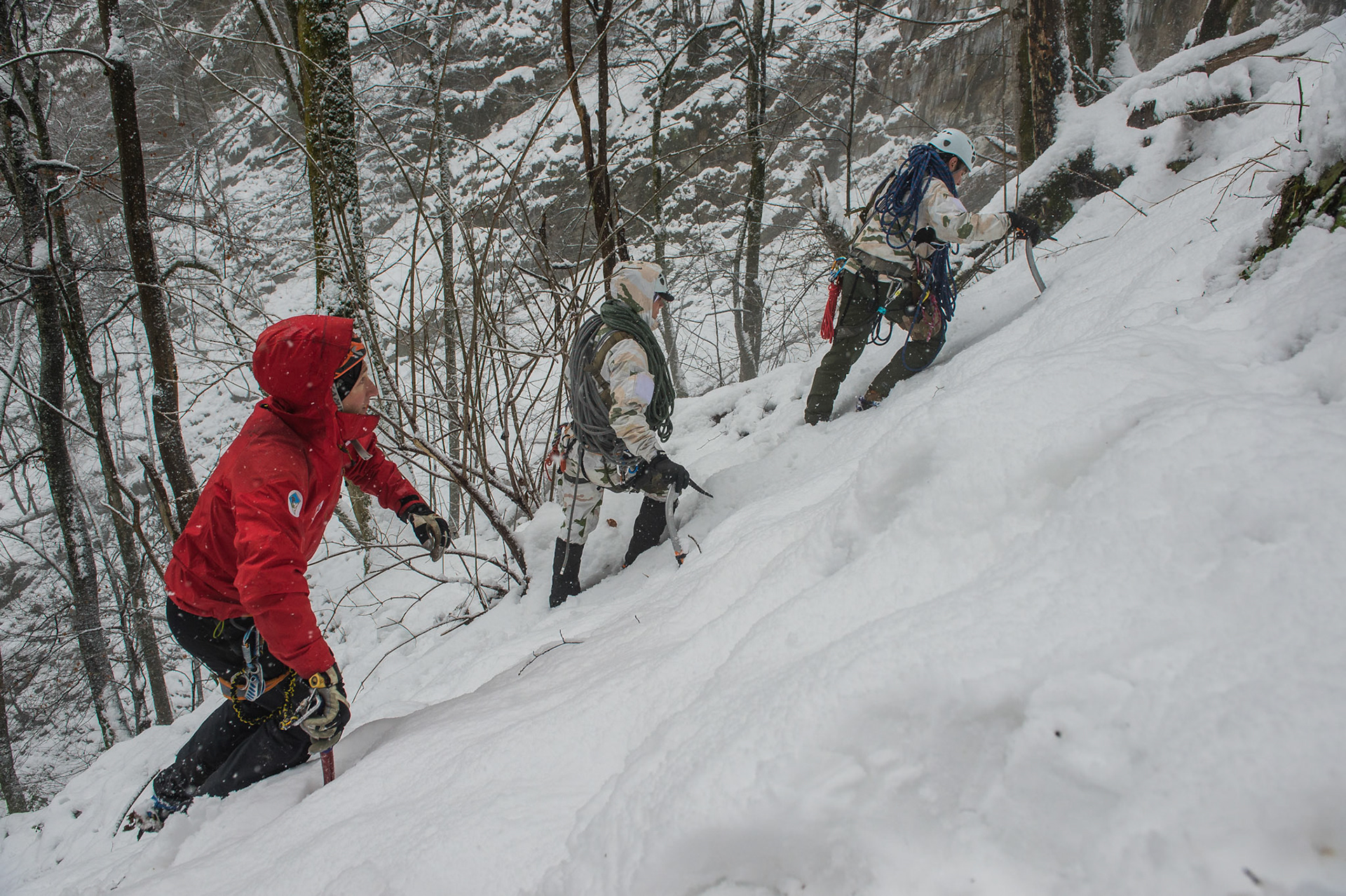 CHAMONIX, FRANCE - JANUARY 29: three people from the Land Force hiking in the mountains during a crossing exercise with the GMHM (High Mountain Military Group), Auvergne-Rhône-Alpes, Chamonix, France on January 29, 2015 in Chamonix, France. (Photo by Fred Marie/Art In All Of Us/Corbis via Getty Images)