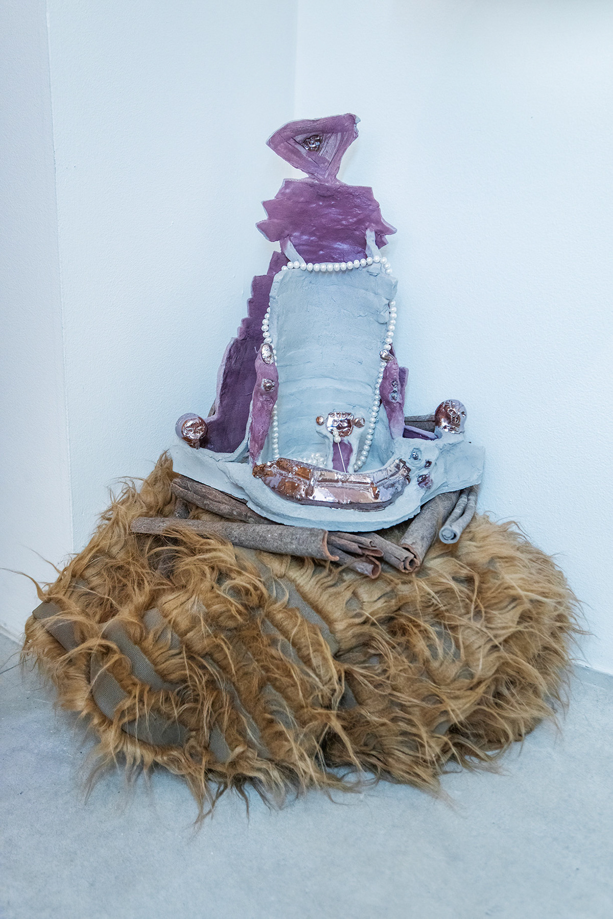 Bodyssey Craft, 2022, glazed ceramic, pearls, cinnamon sticks, hairy fabric, 45 x 40 x 27 cm