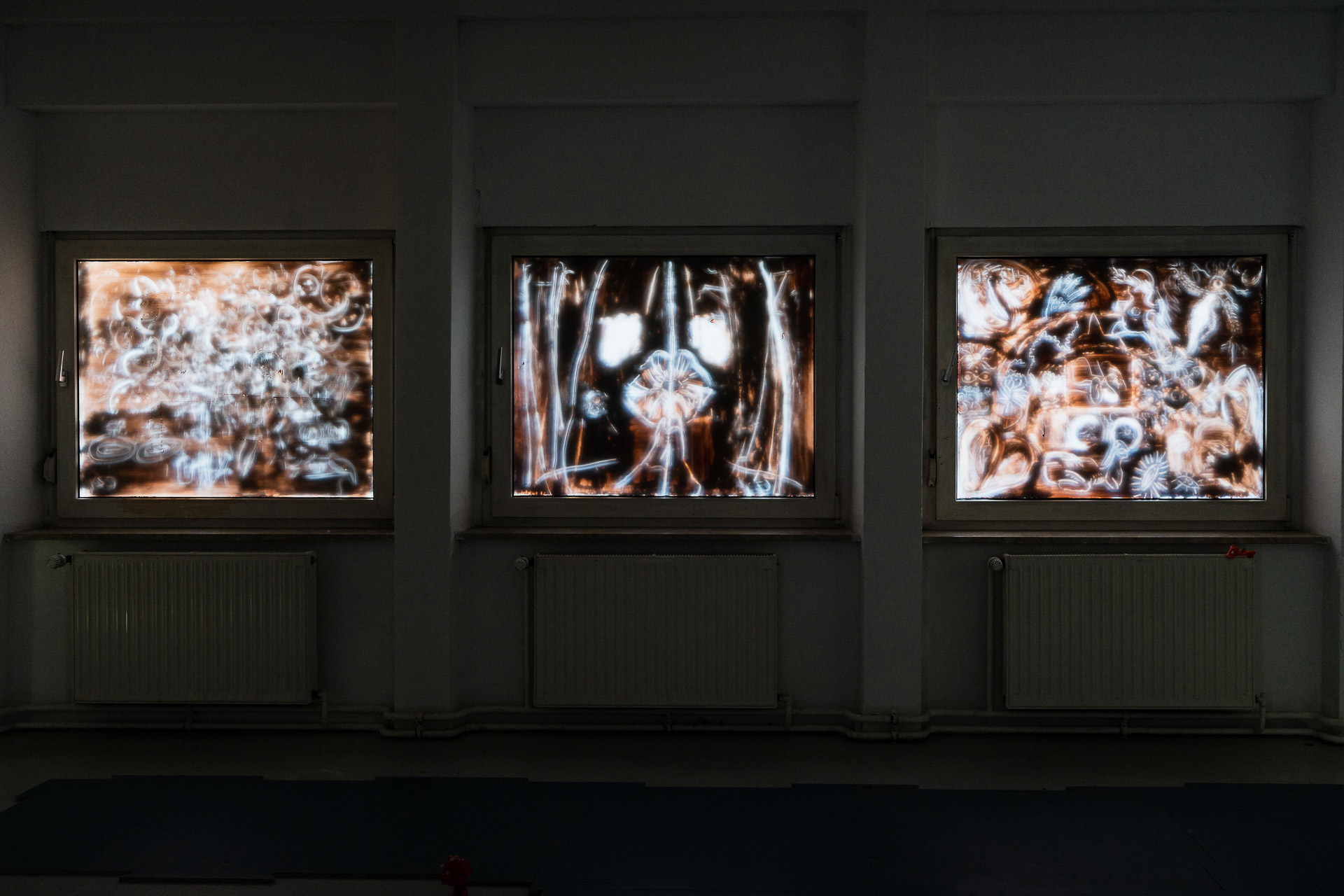 Kapha, Vata, Pitta, 2023, paintings on windows, clay, wheat glue.