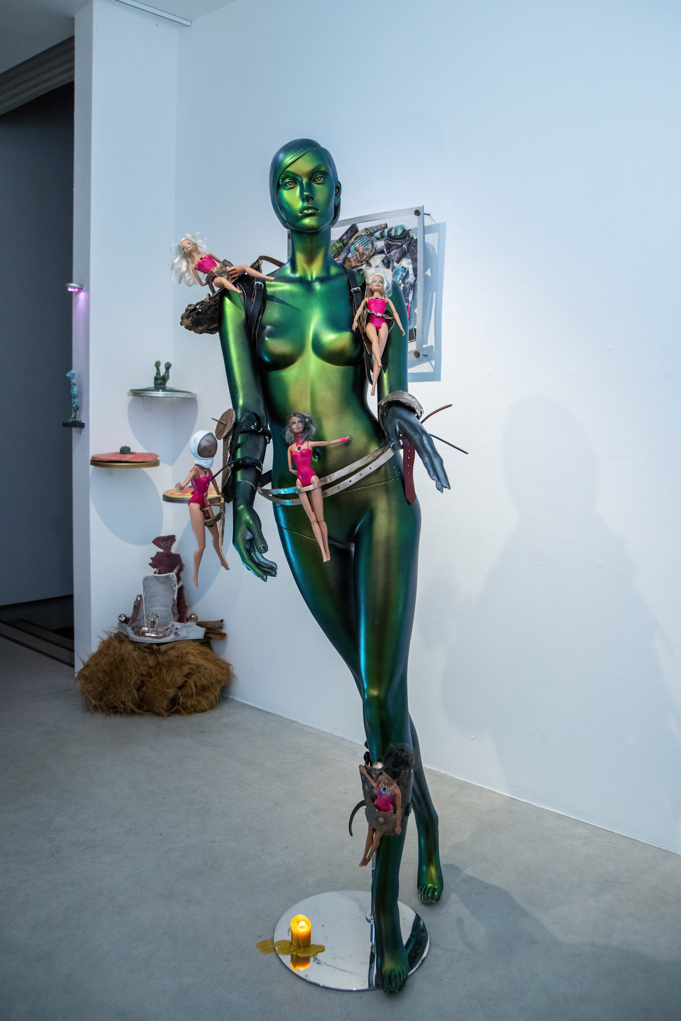 Gynoid 1, 2022, PVC, chameleon paint, bronze, leather, sandstone, VideoGirl Barbie dolls, 175 x 30 x 20 cm