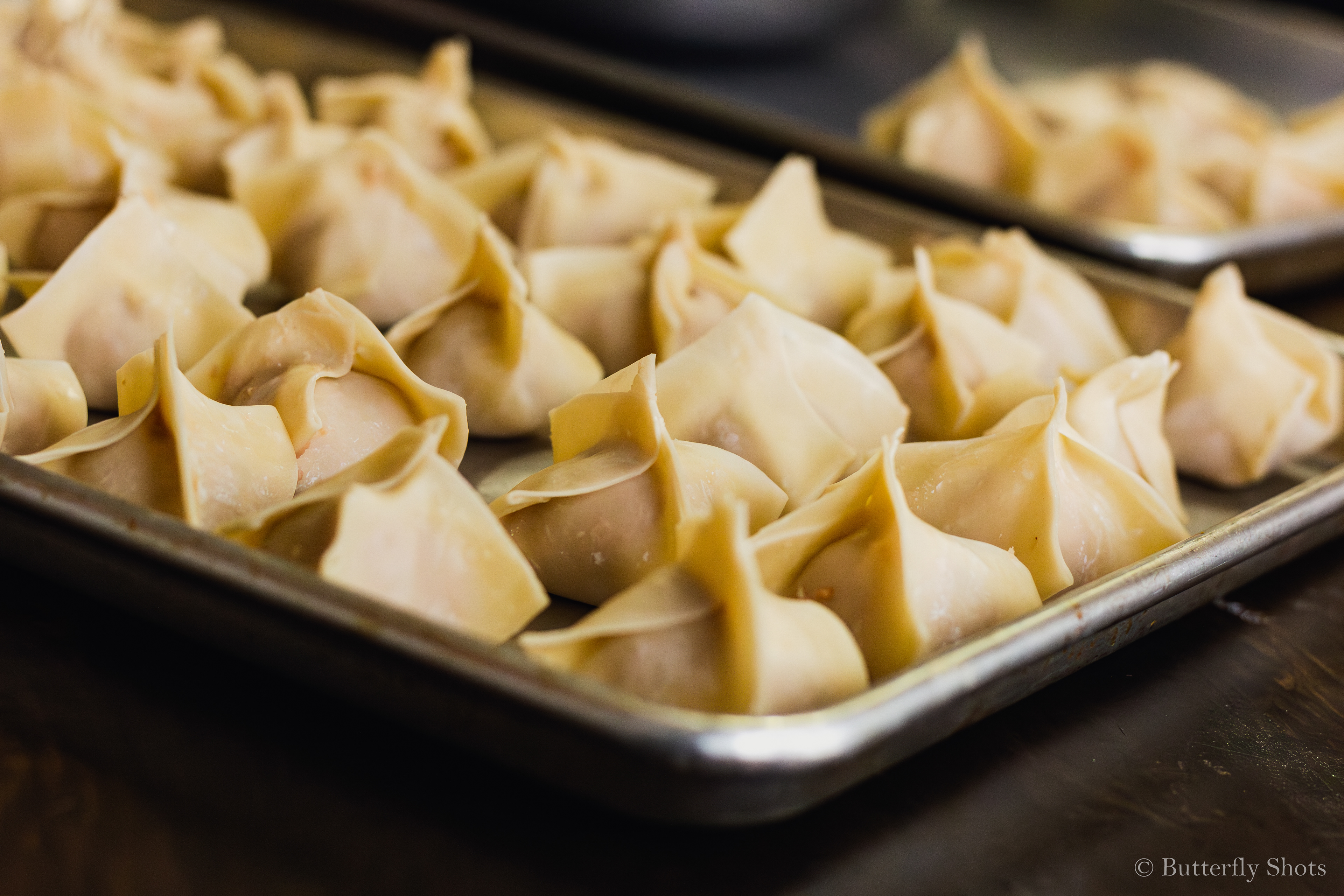 Food photography of won ton soup in the process