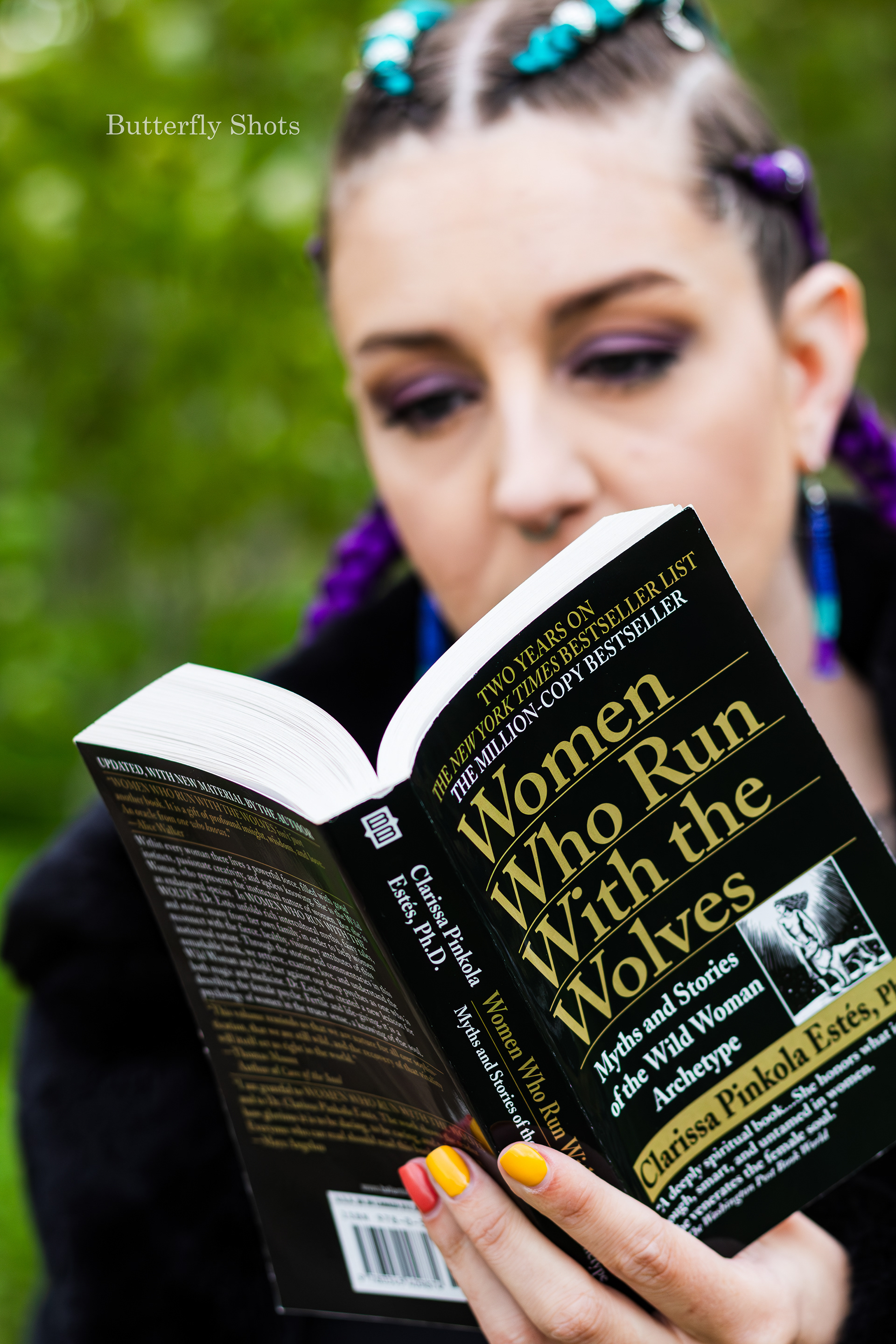 Outdoors self-portrait with book