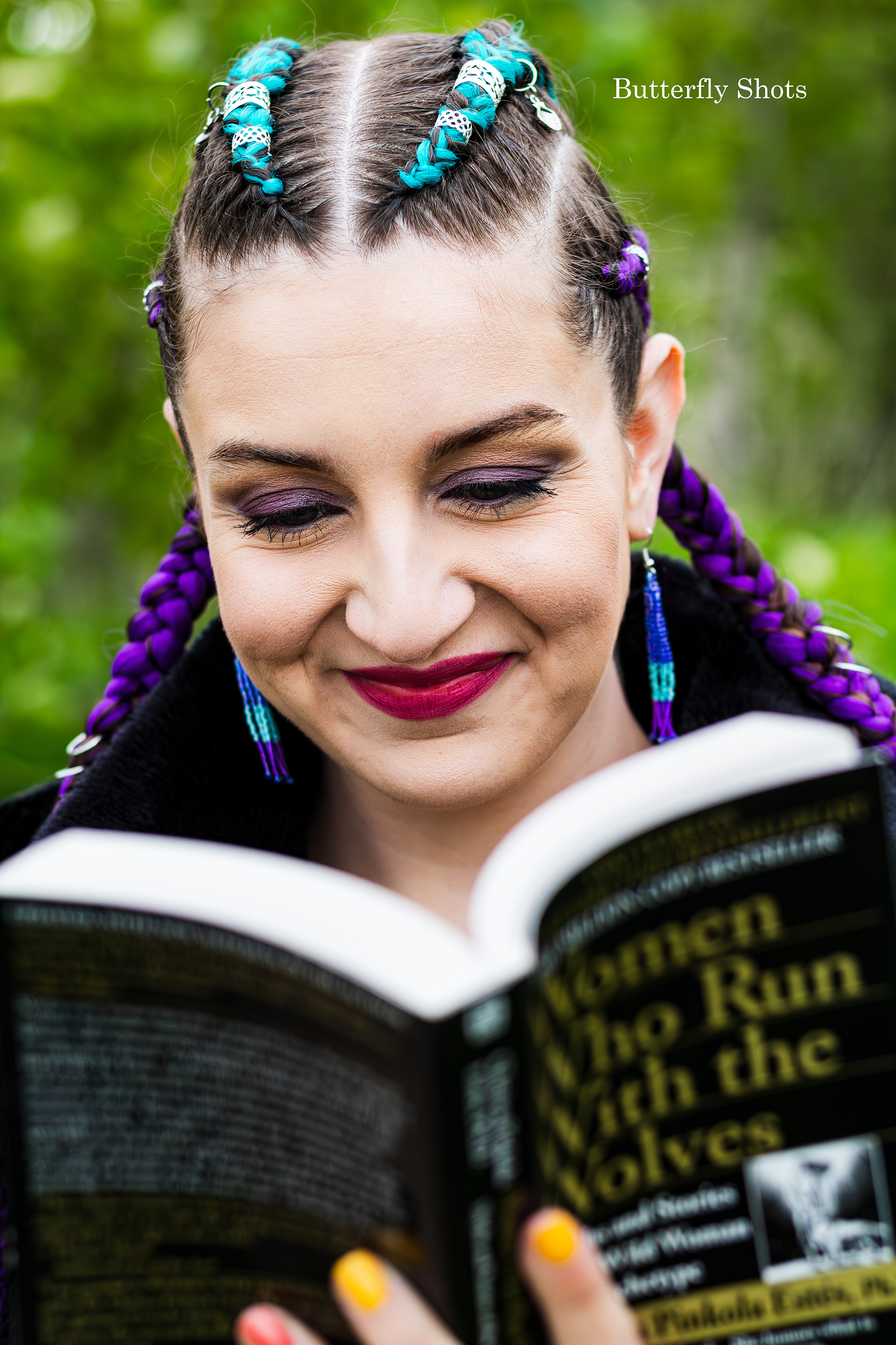 Outdoors self-portrait with book