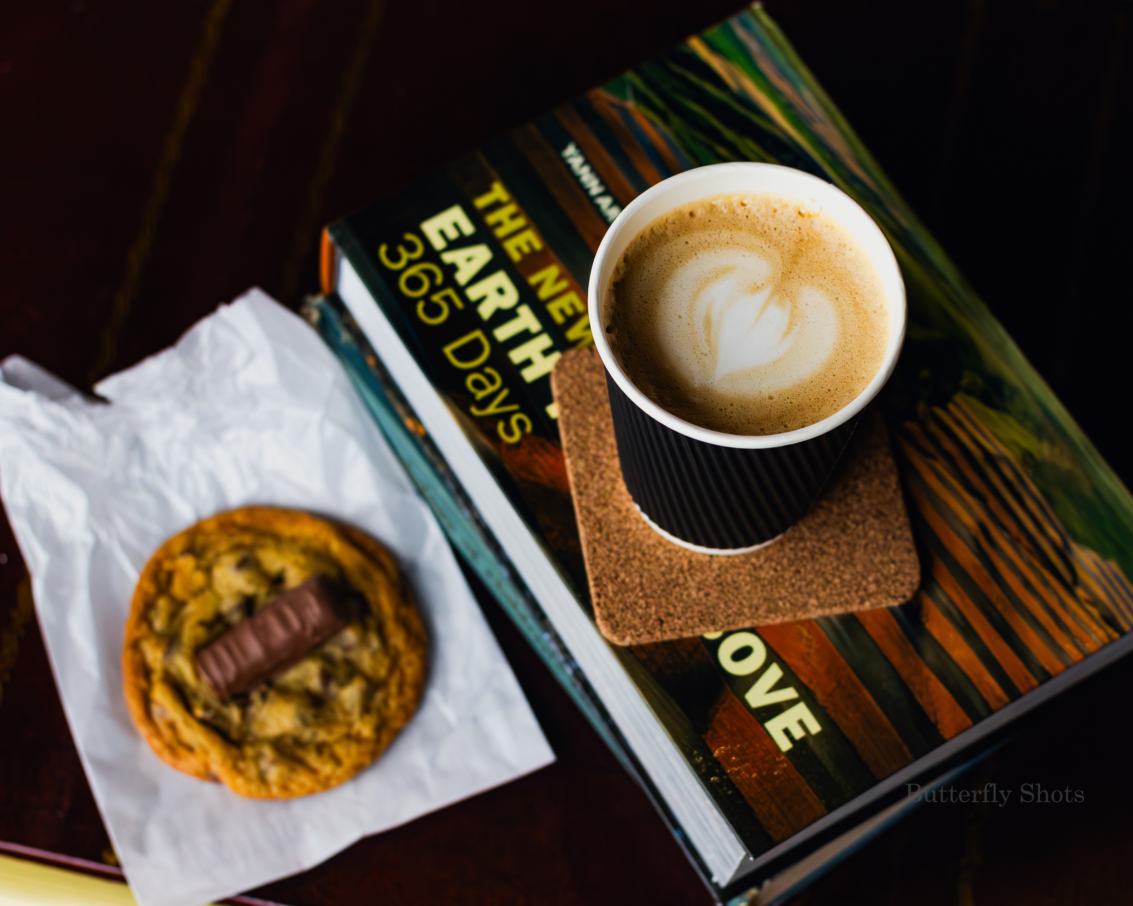 Product photography (food photography) of a latte coffee and a cookie