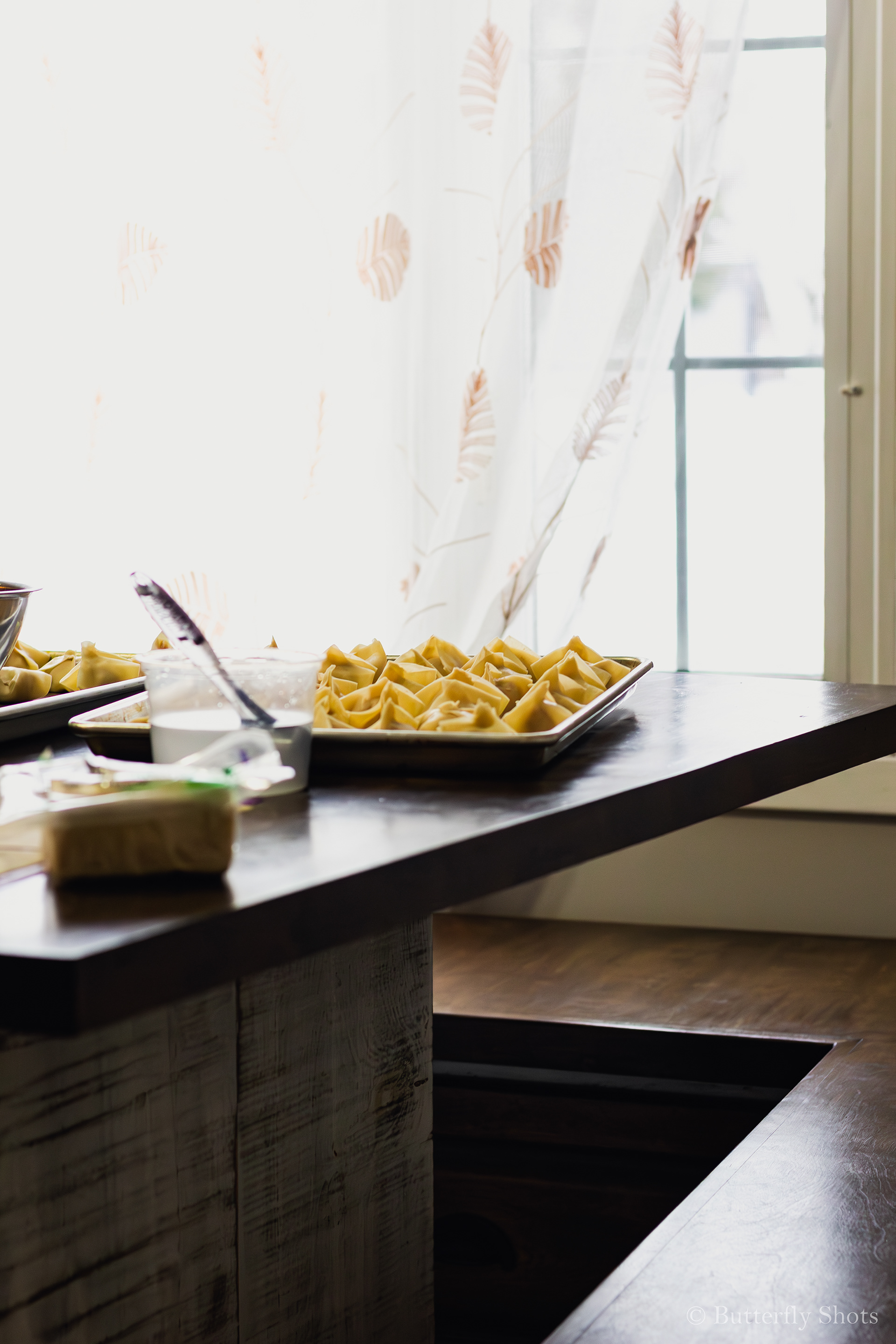 Food photography of won ton soup in the process