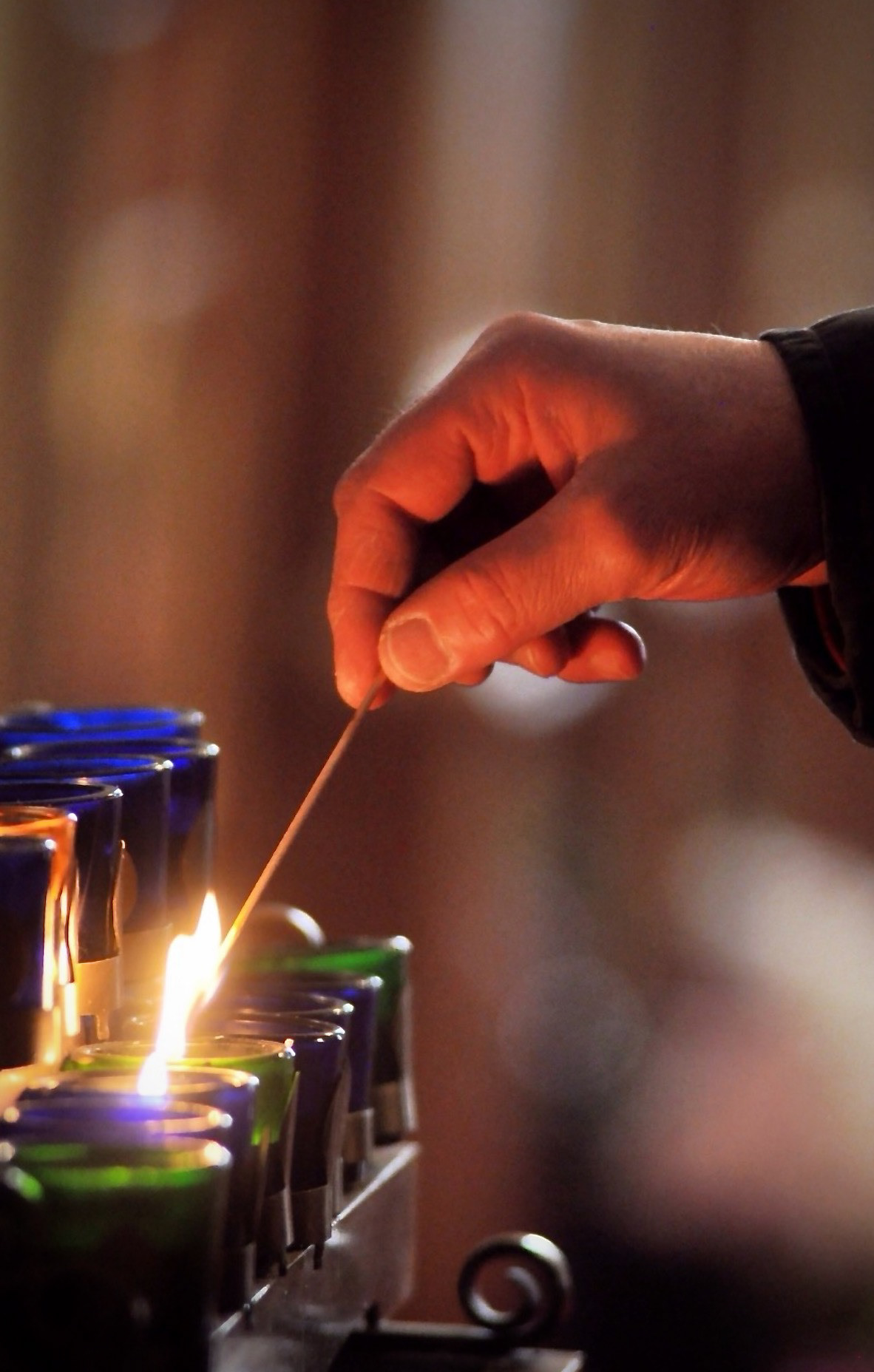 Lightinmg Candles at Mother Cabrini Shrine, Colorado