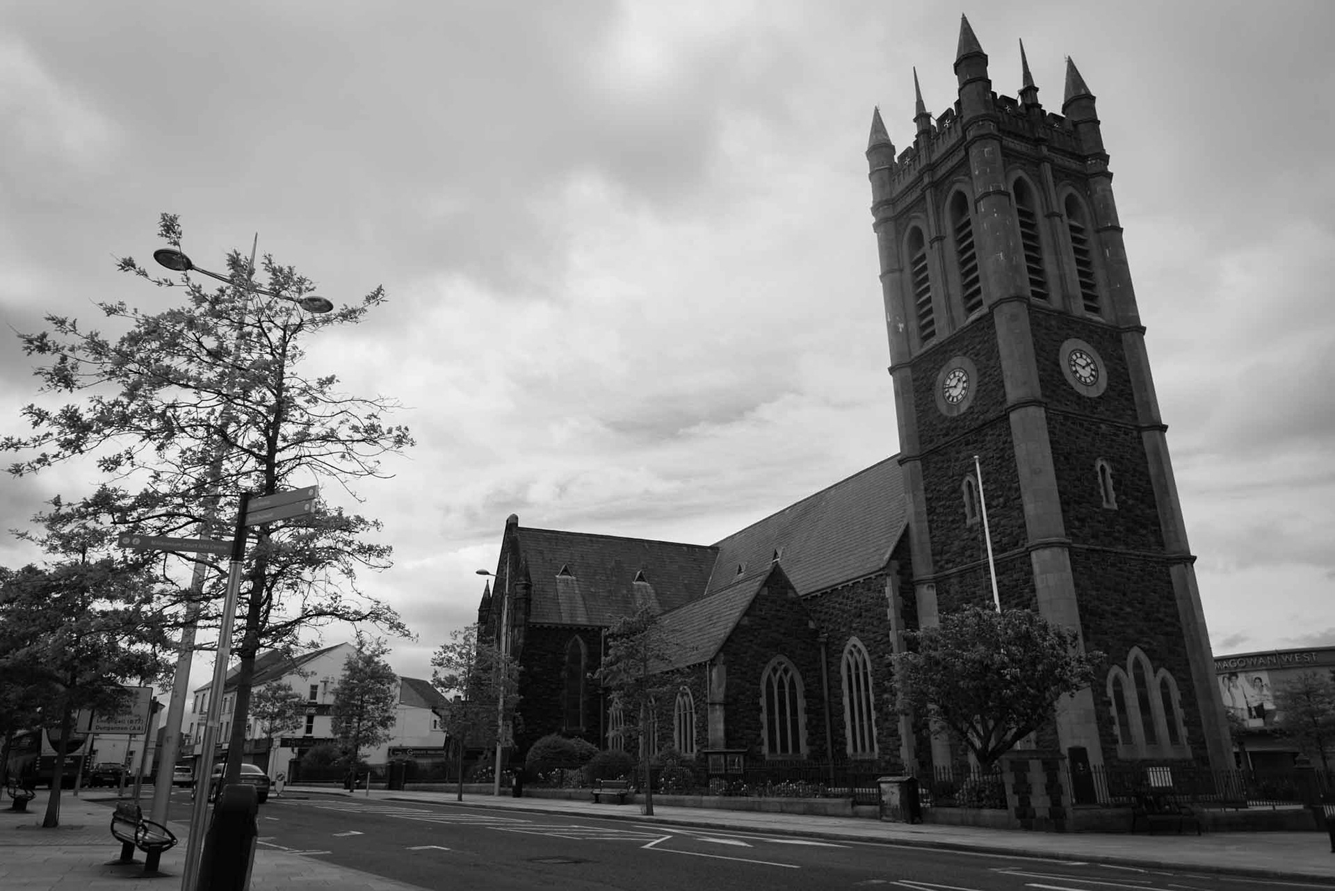 wide photo of st marks church at top of town