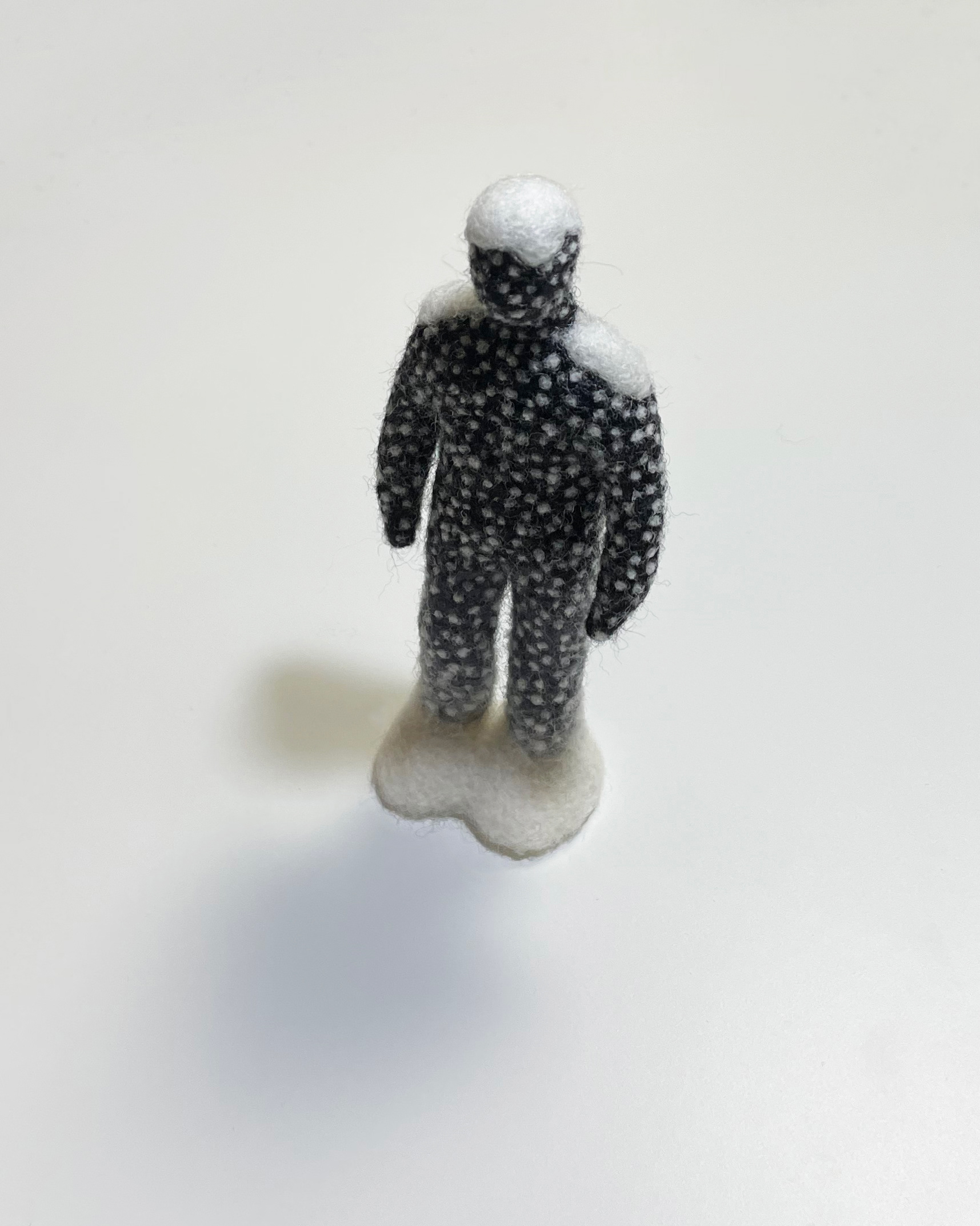 Snow Man, 2022, wool felt, 13.5 × 5.5 × 3 cm