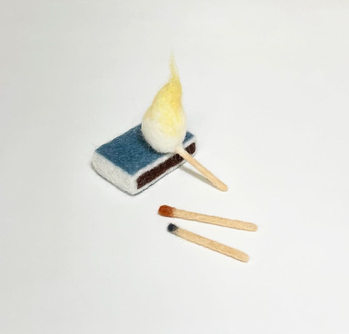 Little Flame, 2022, wool felt, wire, Dimensions variable
