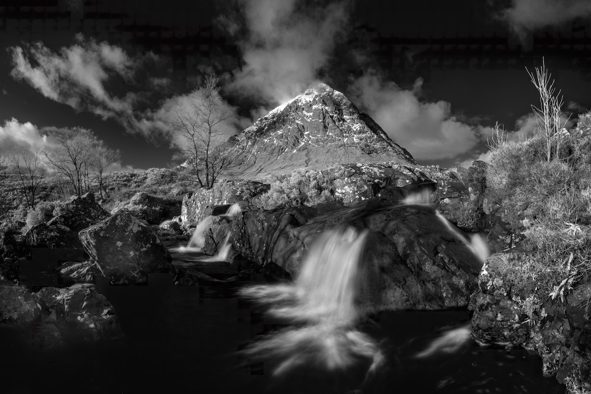 A view of Buachaille Etive Mor from the waterfalls on the River Coupall