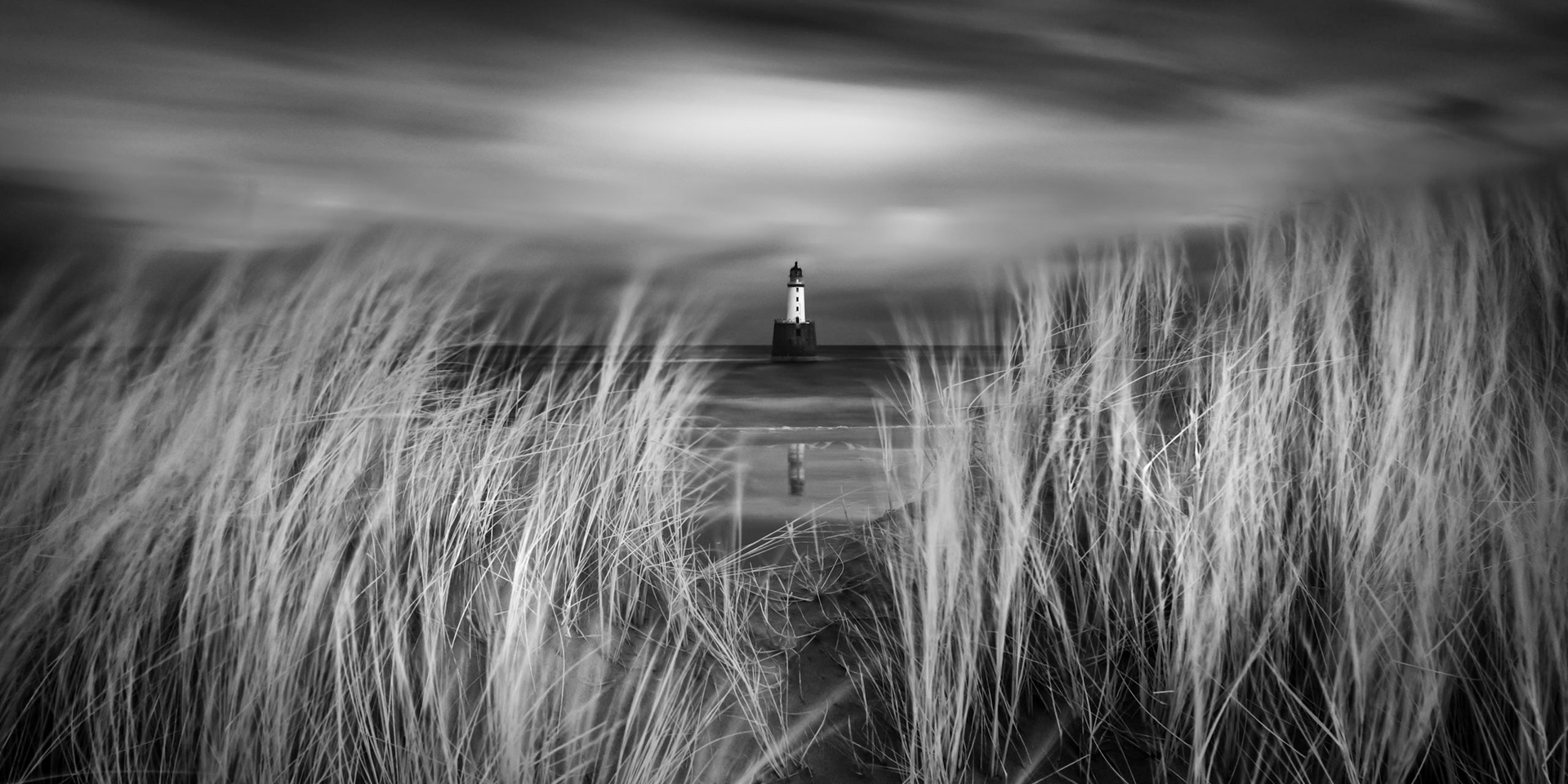 Rattray Head lighthouse stands off the north east coast of Aberdeenshire, Scotland