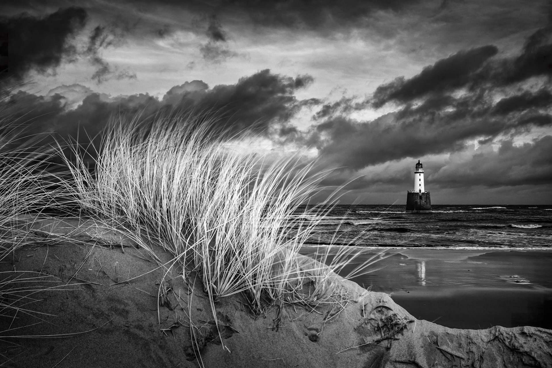 Rattray Head lighthouse stands off the north east coast of Aberdeenshire, Scotland