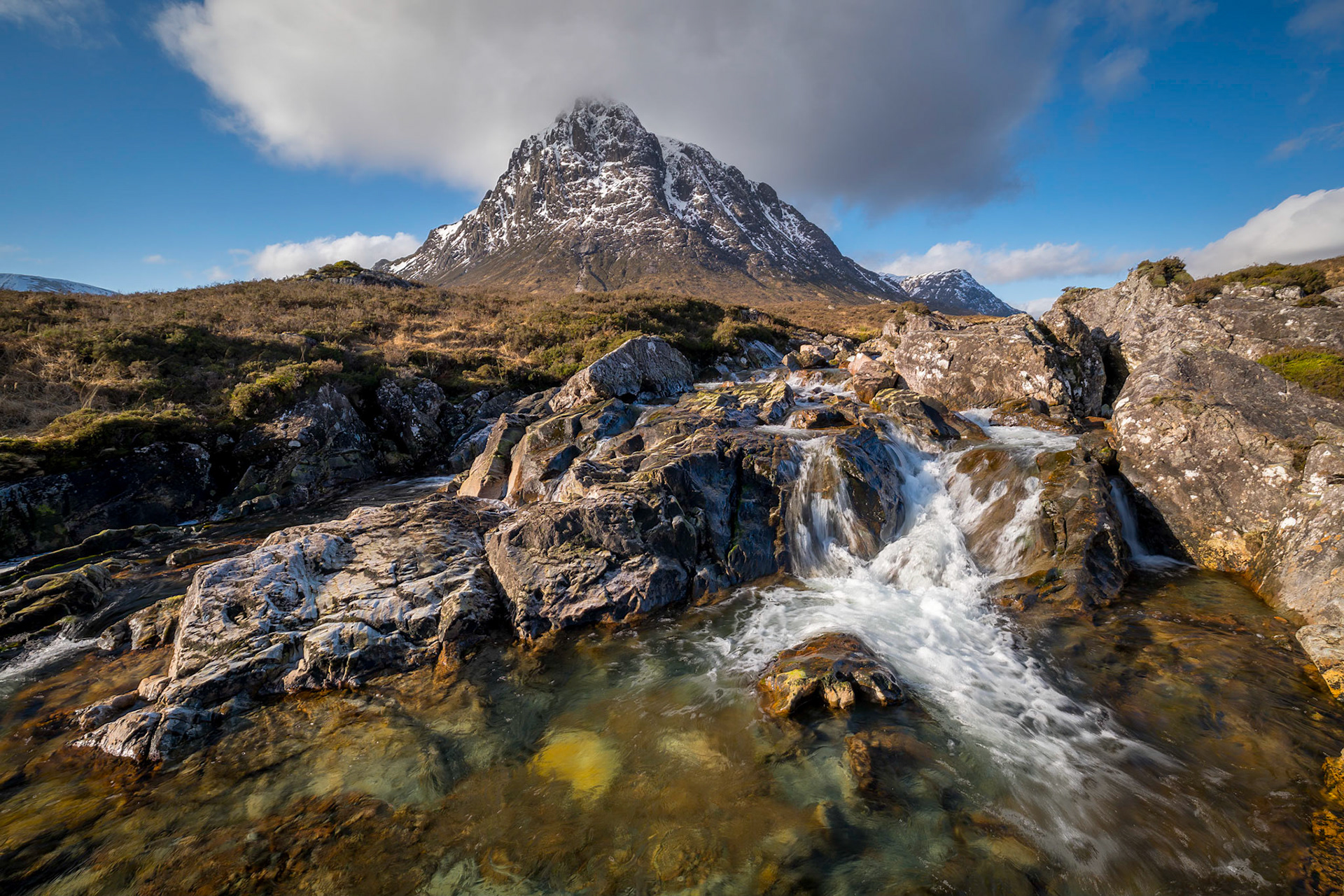 Buachaille Etive Mor overlooking waterfalls on the River Coupall, Glen Coe, Scotland