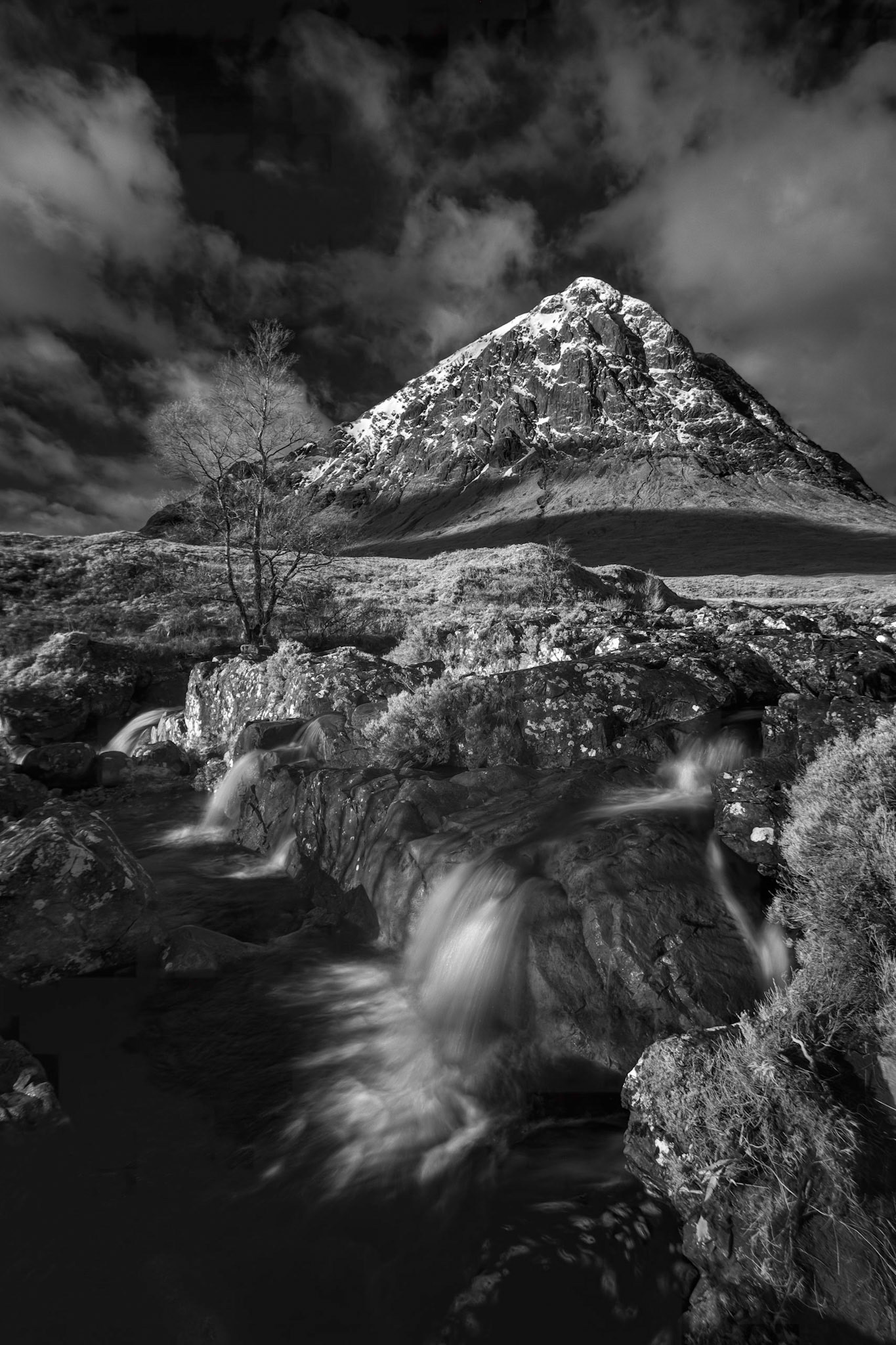 A view of Buachaille Etive Mor from the waterfalls on the River Coupall