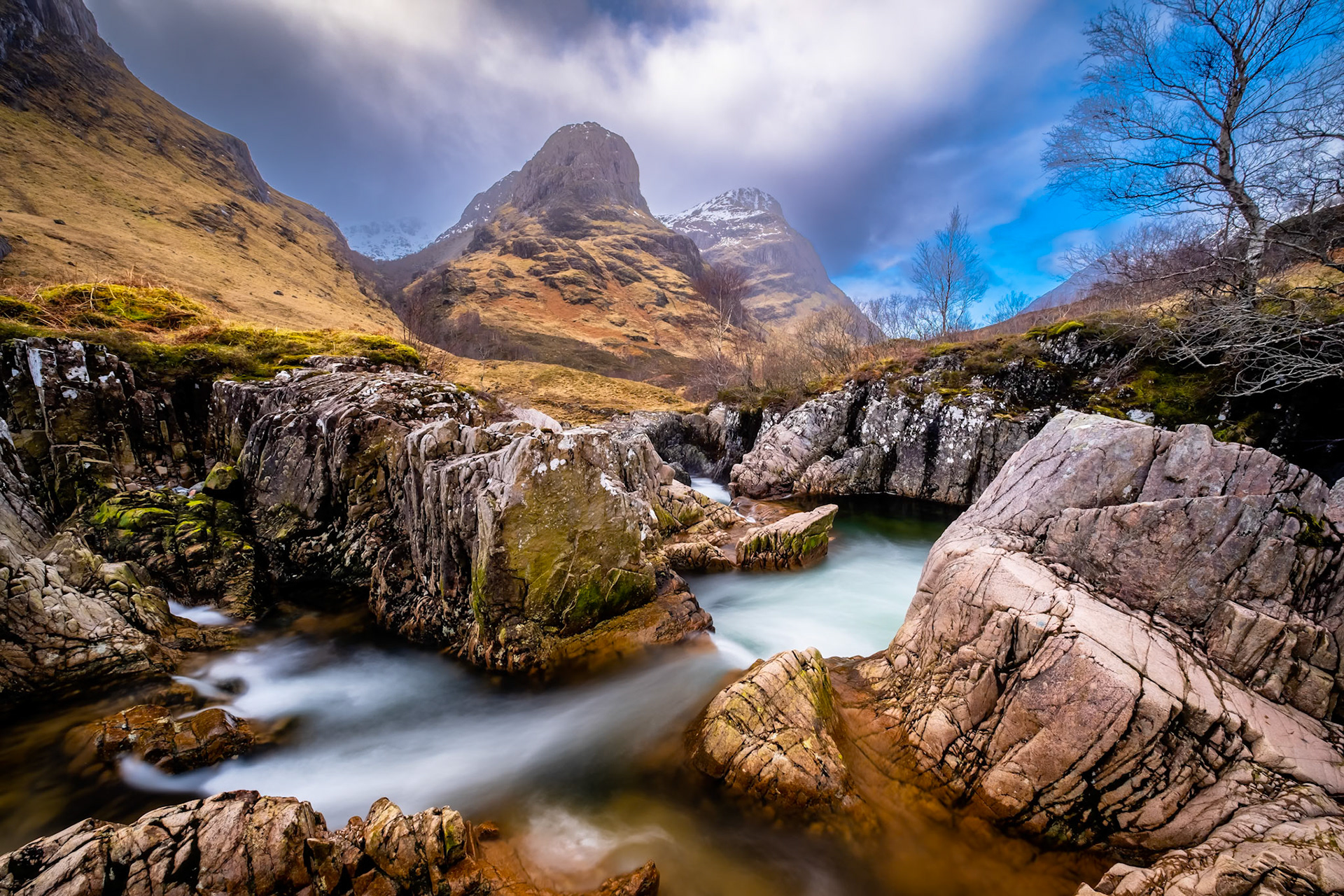 Two of the three sisters of Glen Coe, photographed from the s-bends on the River Coe