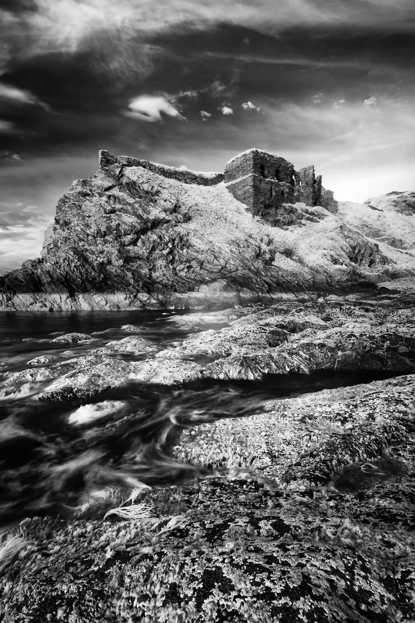 An infrared black and white image of Findlater Castle, which stands on the north east coast of Scotland, near Portsoy