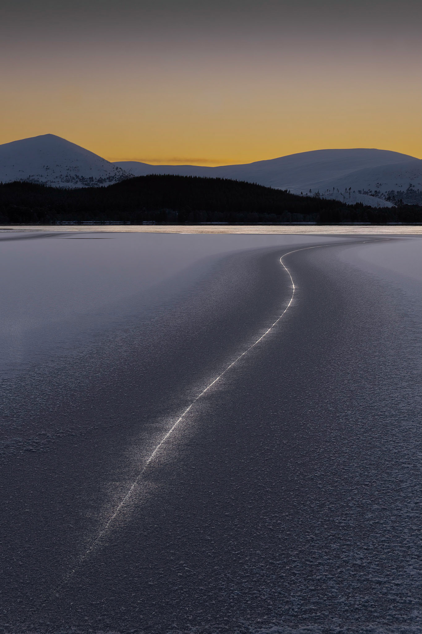 Patterns on the frozen water at Loch Morlich, Cairngorm