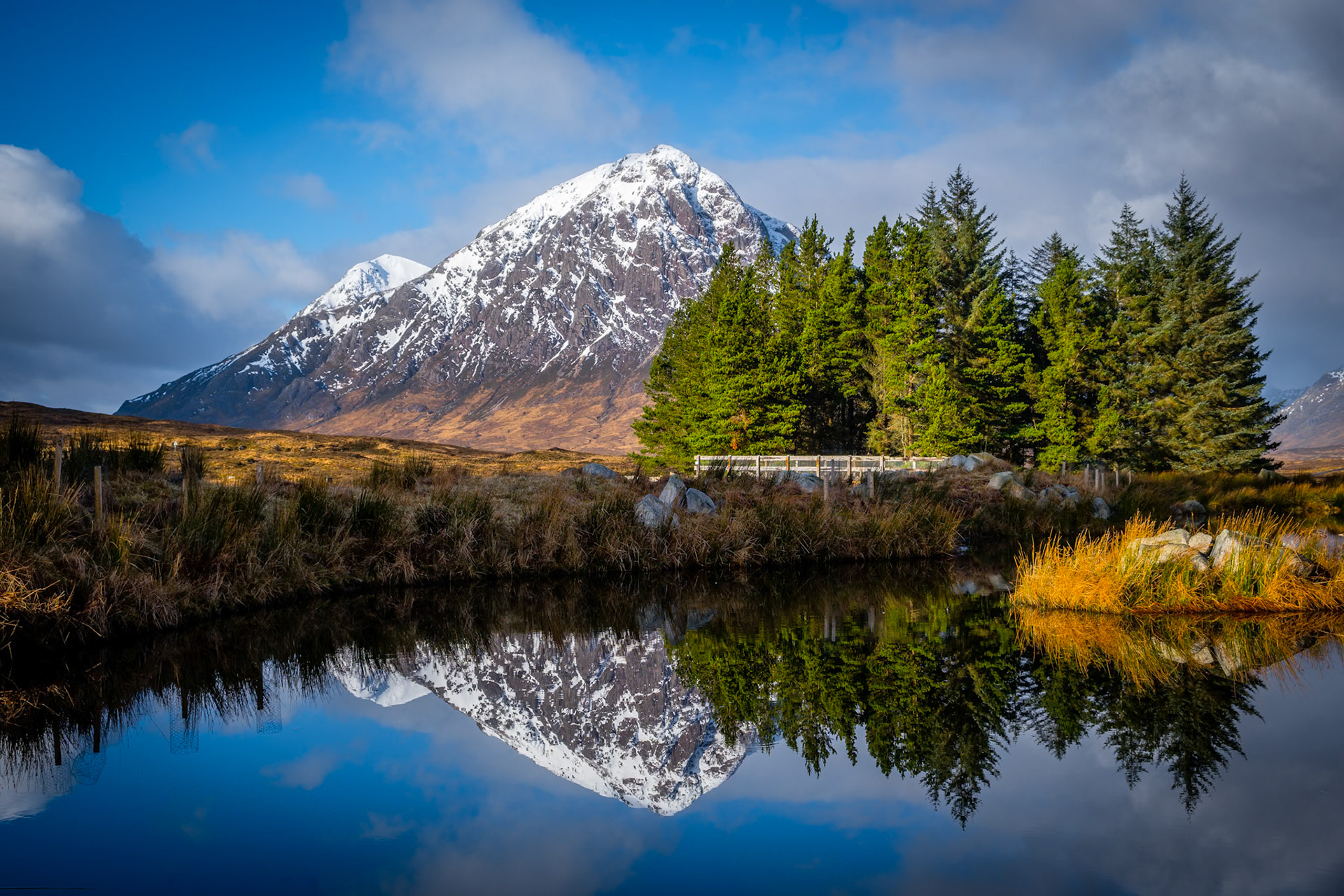 Buachaille Etive Mor in Glen Coe, Scotland, reflected in the pond at the Kingshouse Hotel