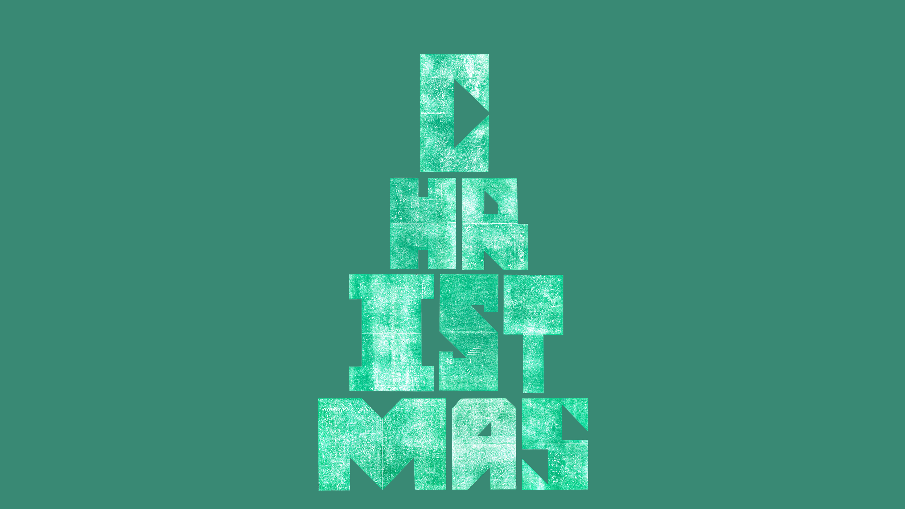 Festive typographic series by Art Director Ben Barnes at  Found Studio, featuring heavy-weight block lettering inspired by the structural constraints of holiday card shapes.