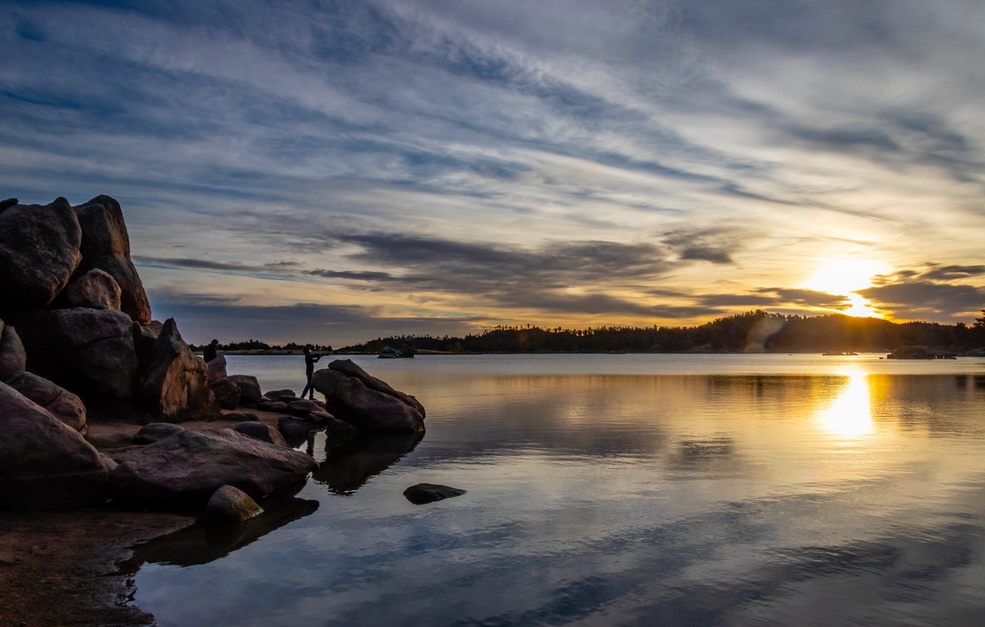 A father and son fishing at sunrise in Red Feather, Colo. on Sept. 29, 2018.