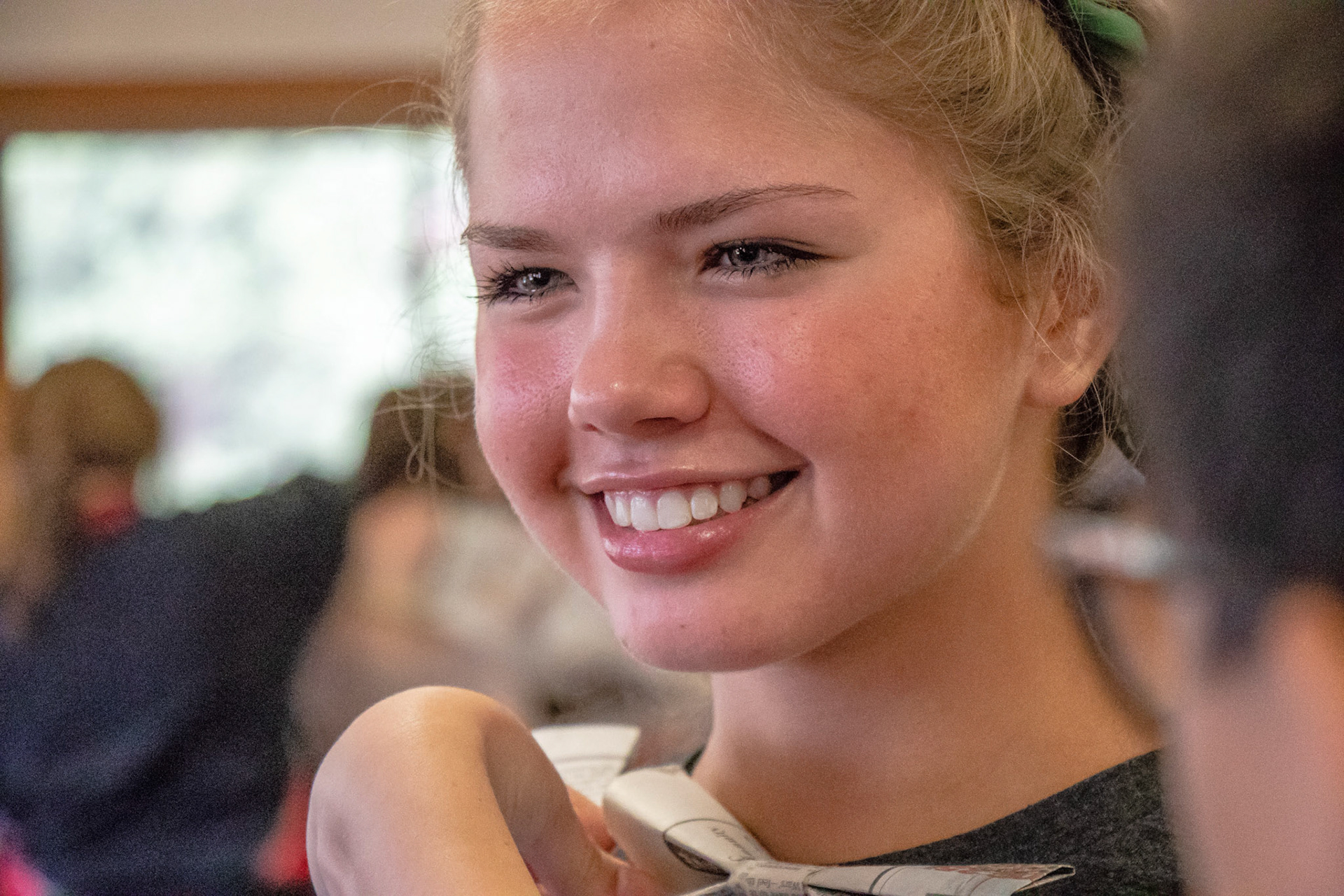 Smiles are all around during the newspaper fashion show at the 2018 Rocky Mountain Rotary Youth Leadership Awards in Estes Park, Colo. 
