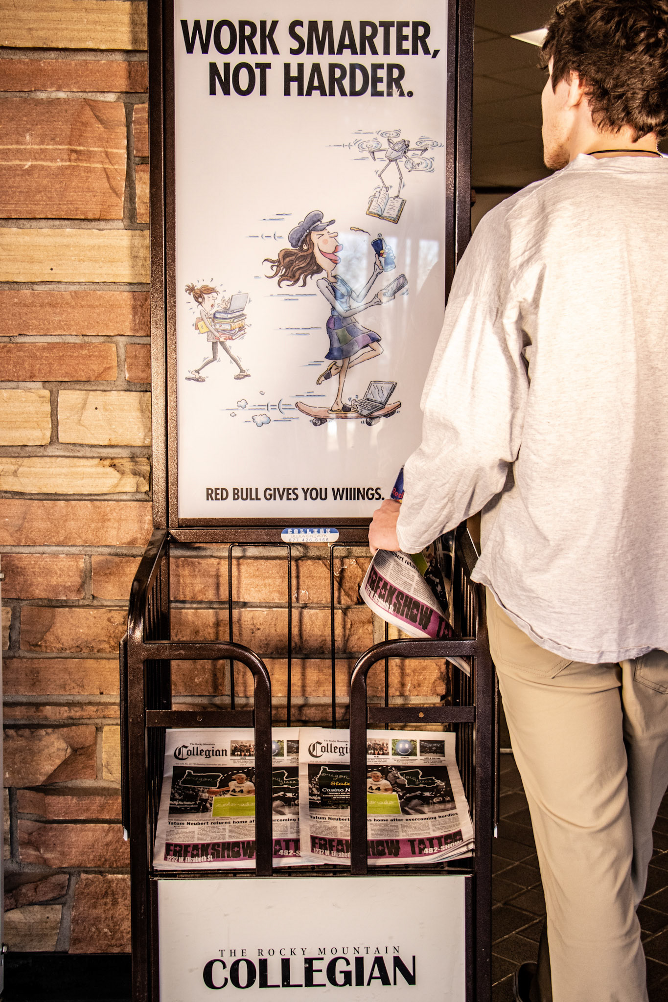 The intent of this image was to showcase the advertising displays above the Collegian's newspaper stands.