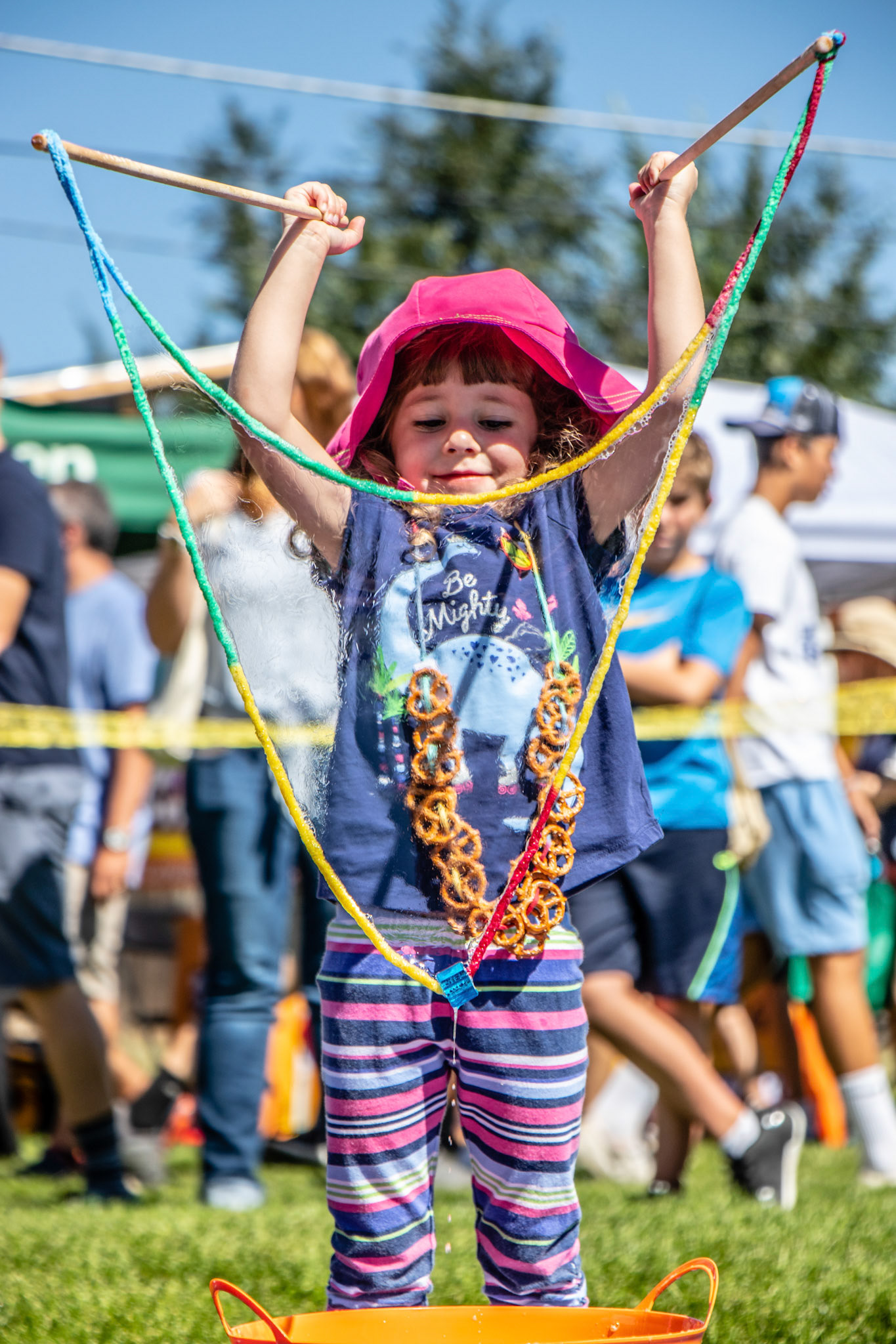 Claire Hathaway is full of joy while making giant bubbles.