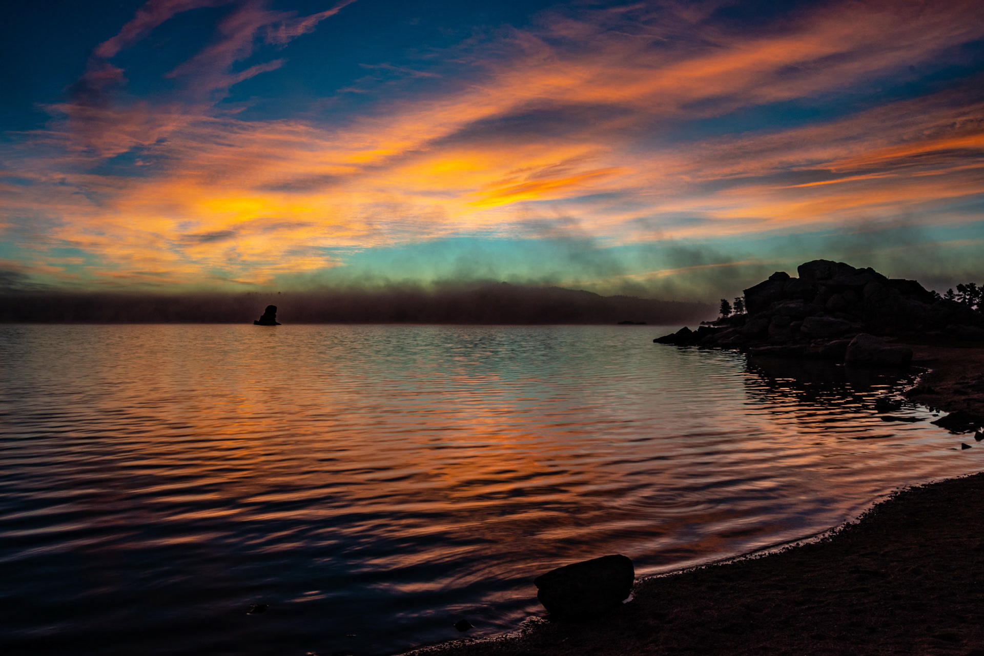 Fog rising off of Dowdy Lake during sunrise in Red Feather Lakes, Colo. on Sept. 30, 2018.