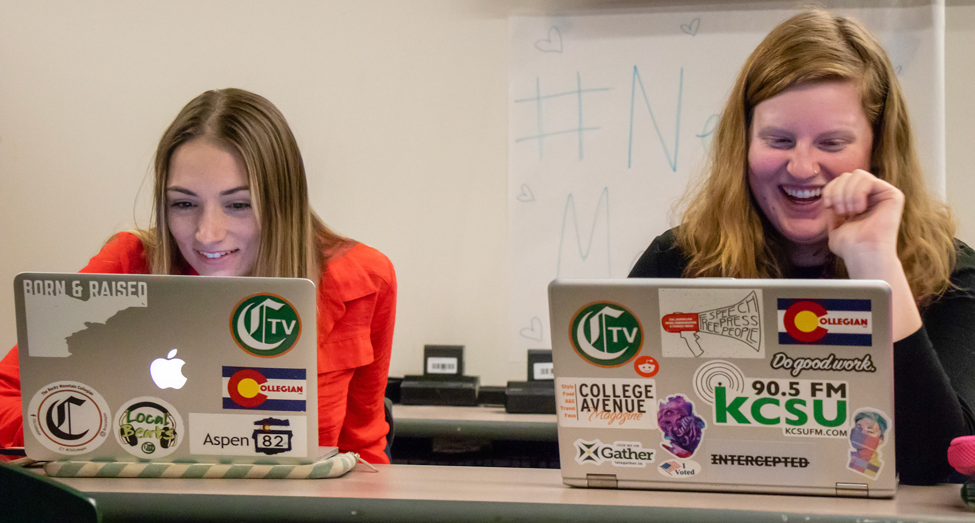 This photo was chosen because it exhibits students' pride of Student Media through their stickers.