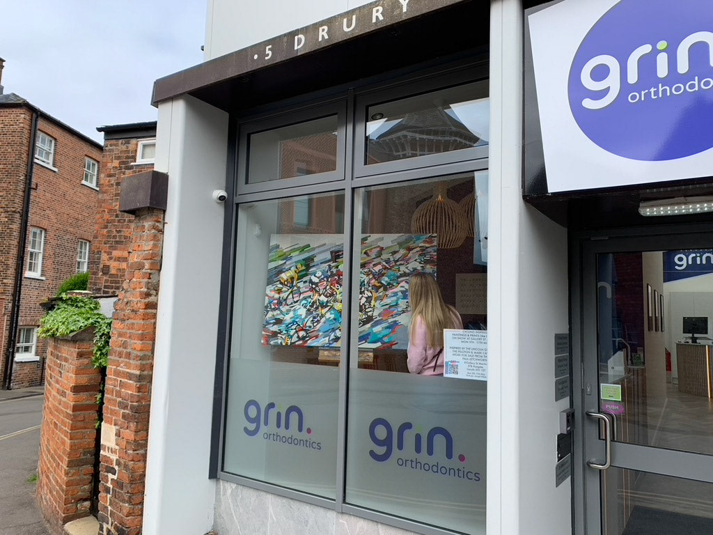 Painting "In yellow" being hosted in Grin Othodontics Lincoln