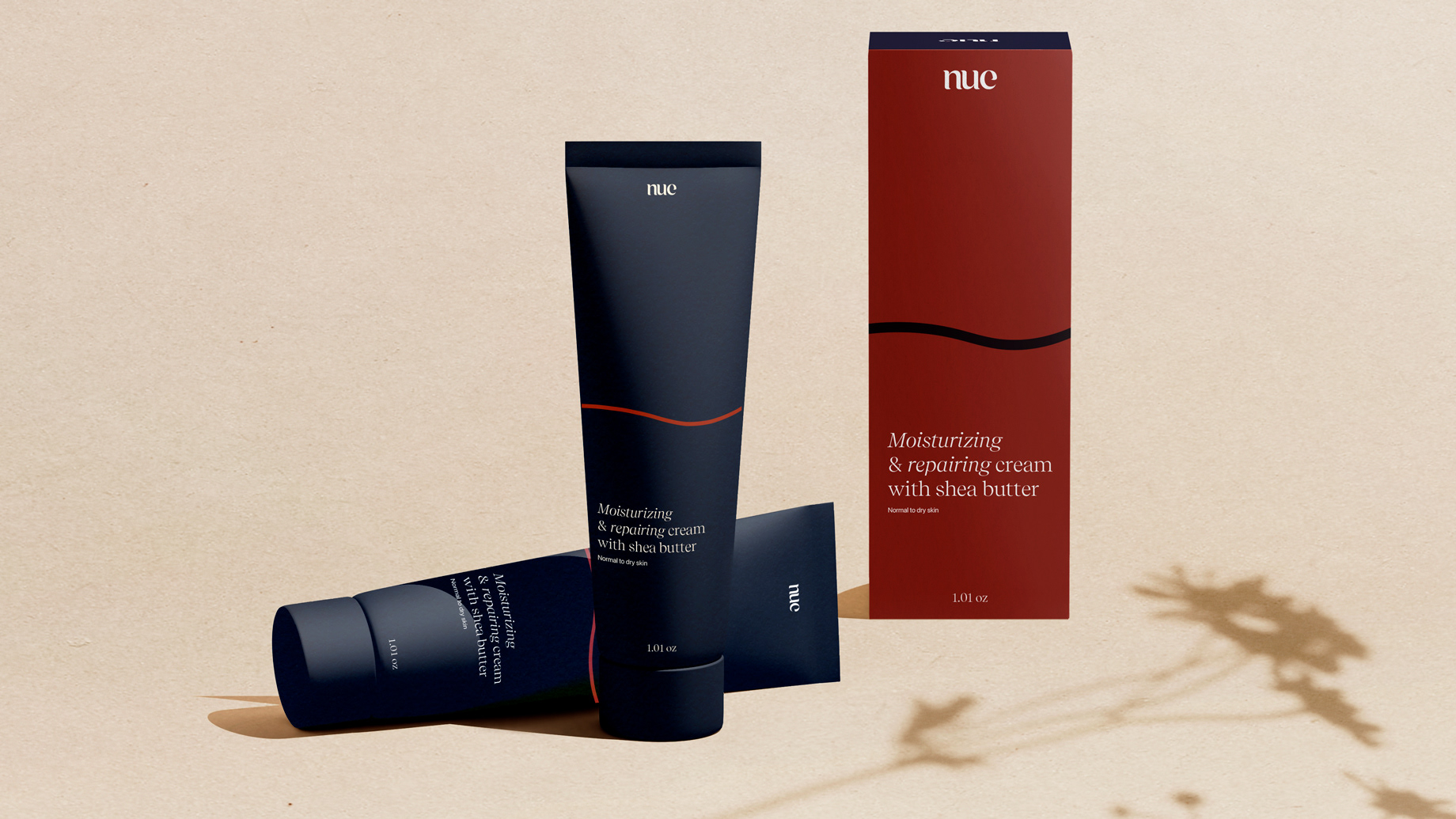Two blue moisturizer tubes with red box